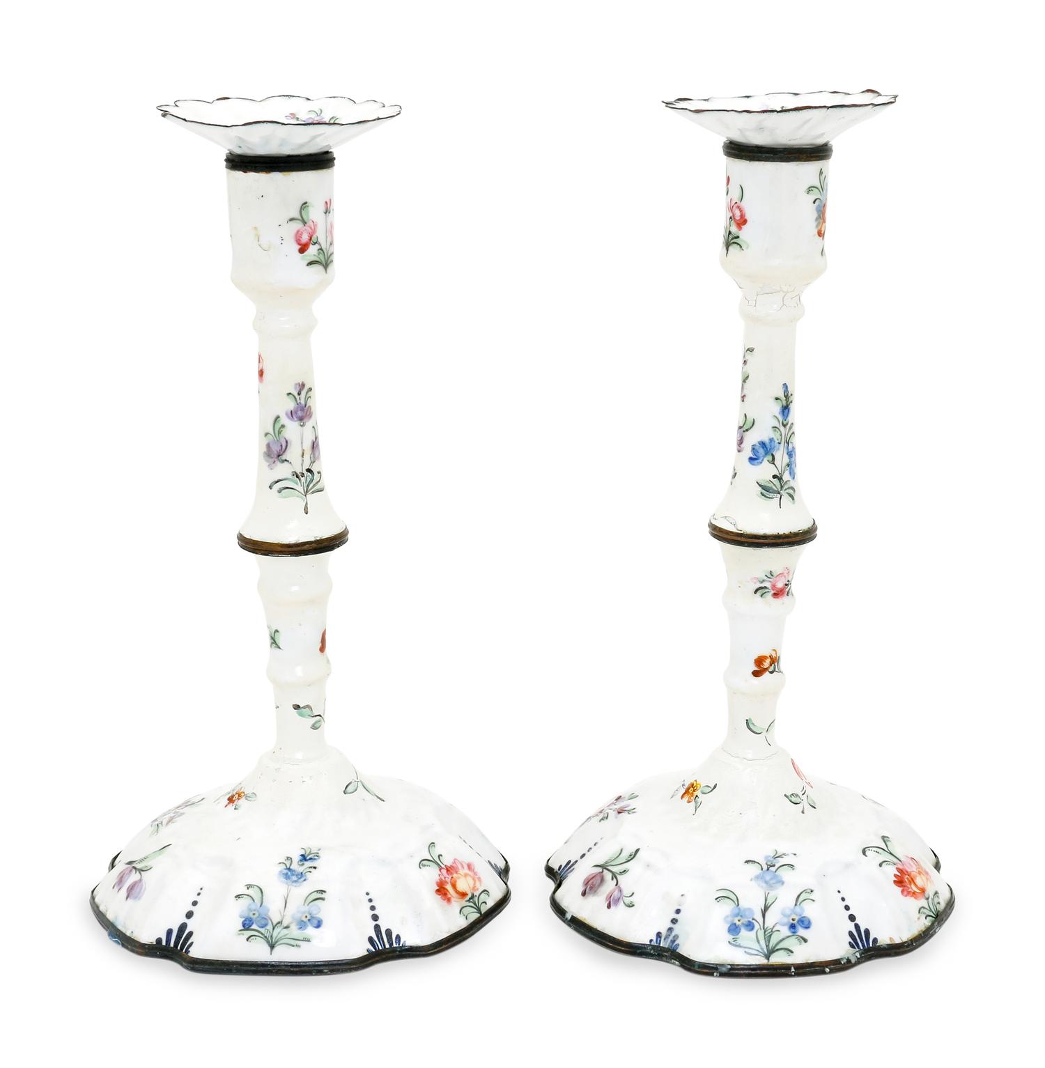 A Pair of Battersea Enamel Candlesticks