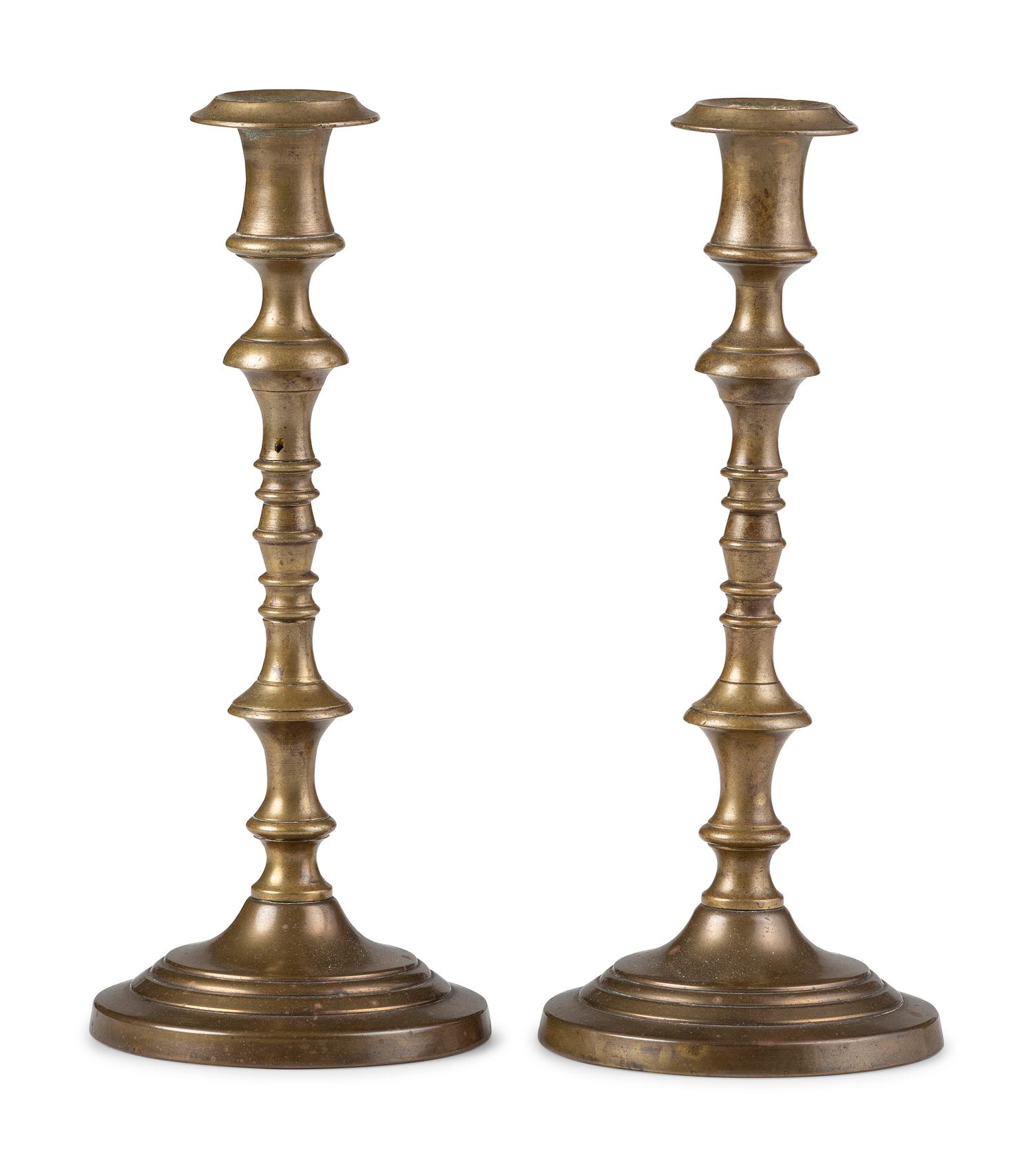 Three Pairs of English Brass Candlesticks