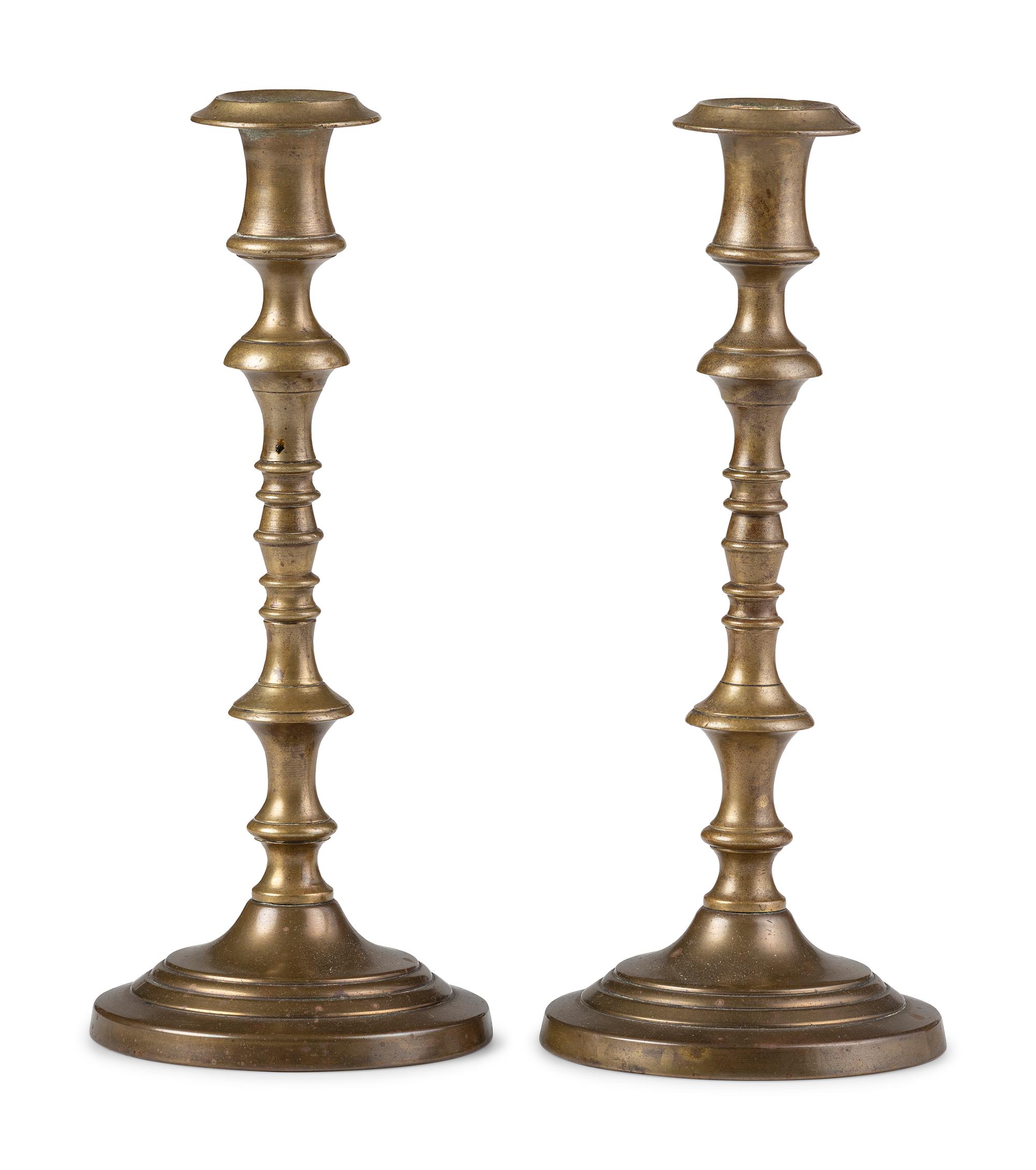 Three Pairs of English Brass Candlesticks