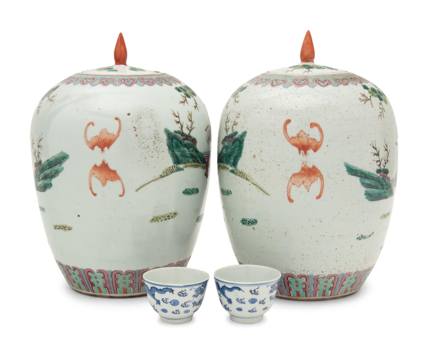 A Pair of Chinese Famille Rose Porcelain Covered Jars and A Pair of Blue and White Porcelain Bowls