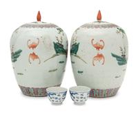 A Pair of Chinese Famille Rose Porcelain Covered Jars and A Pair of Blue and White Porcelain Bowls