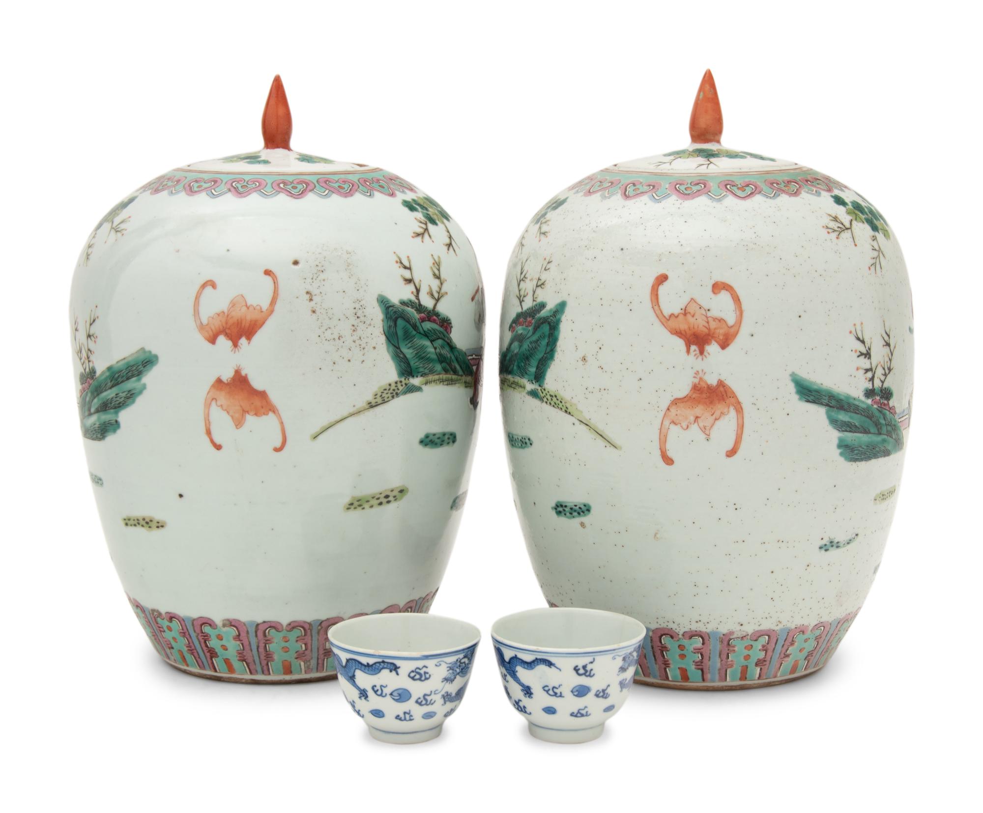 A Pair of Chinese Famille Rose Porcelain Covered Jars and A Pair of Blue and White Porcelain Bowls