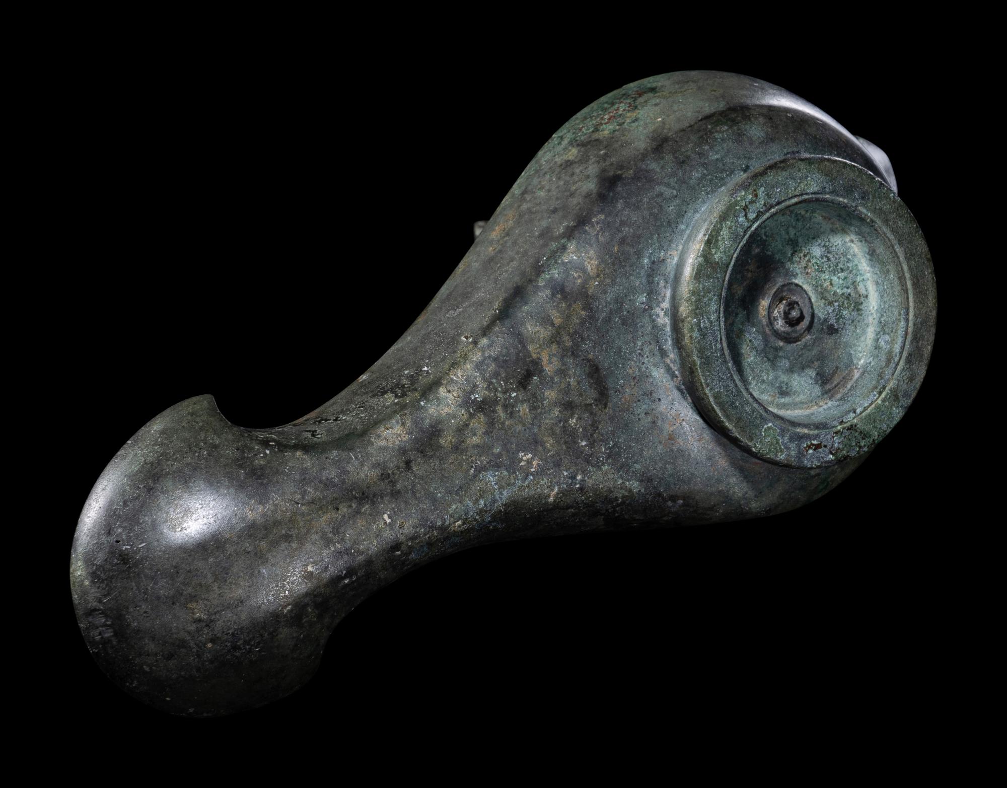 A Roman Bronze Horse Head Oil Lamp