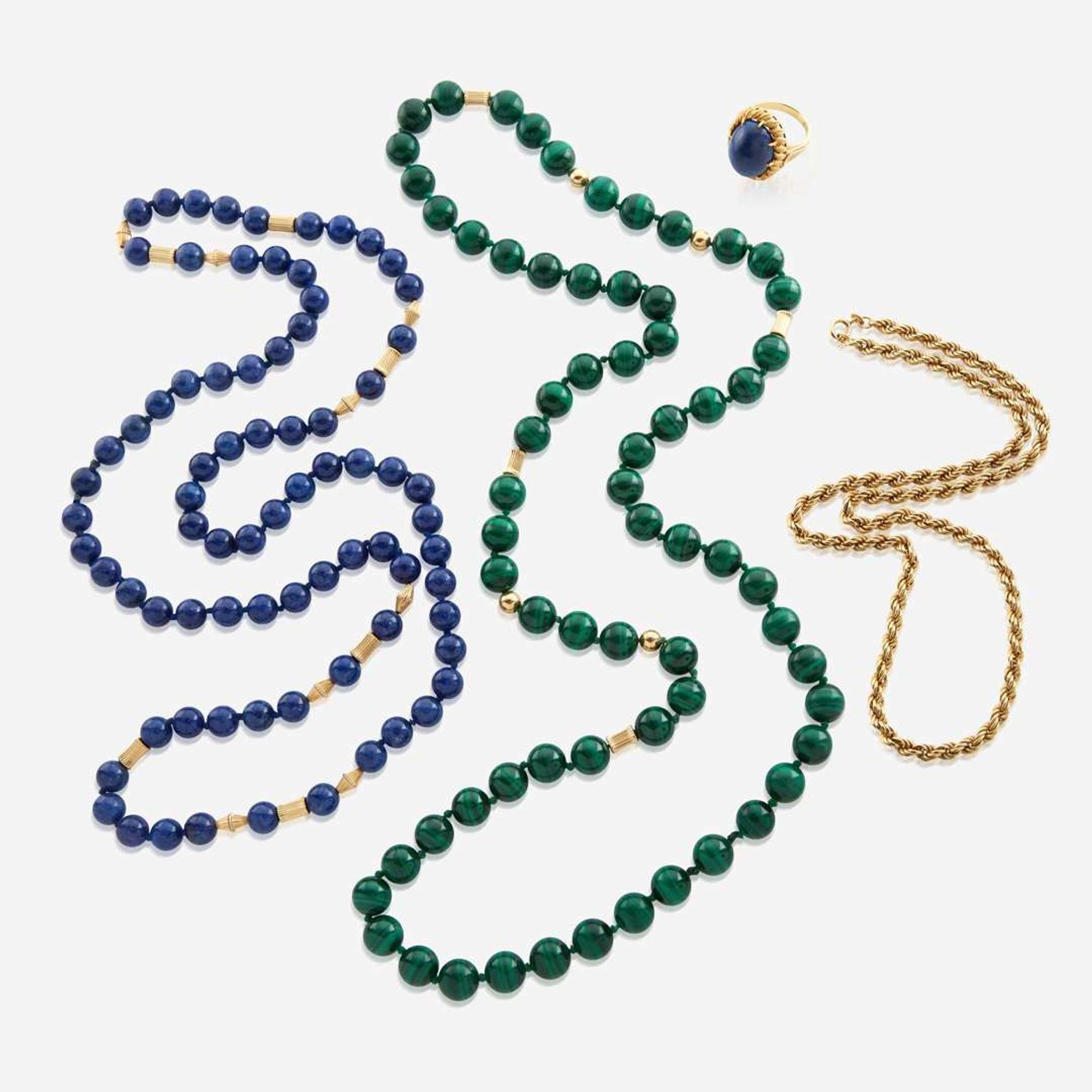 A collection of gold and gem-set jewelry