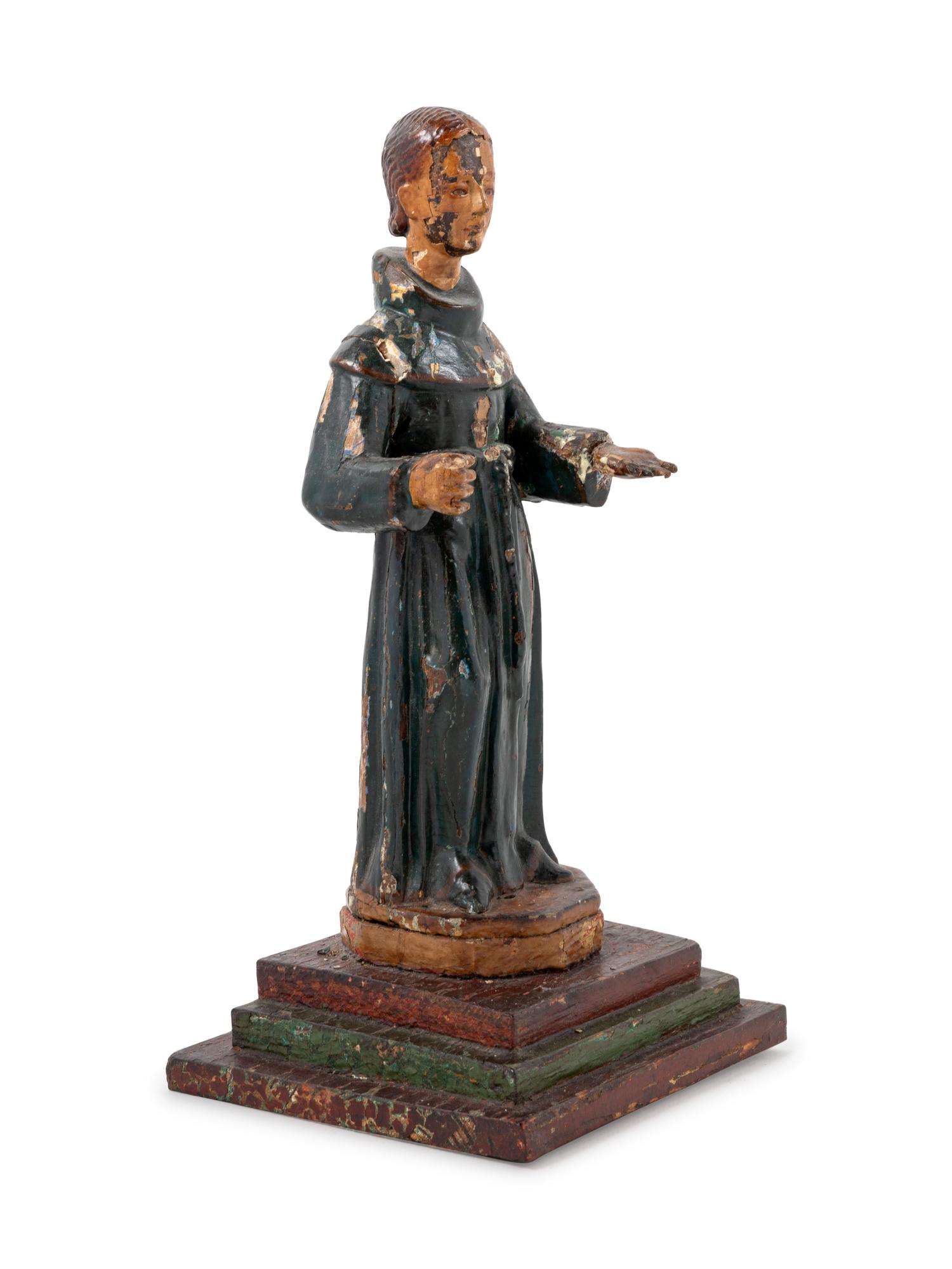 A Continental Painted Figure of a Saint
