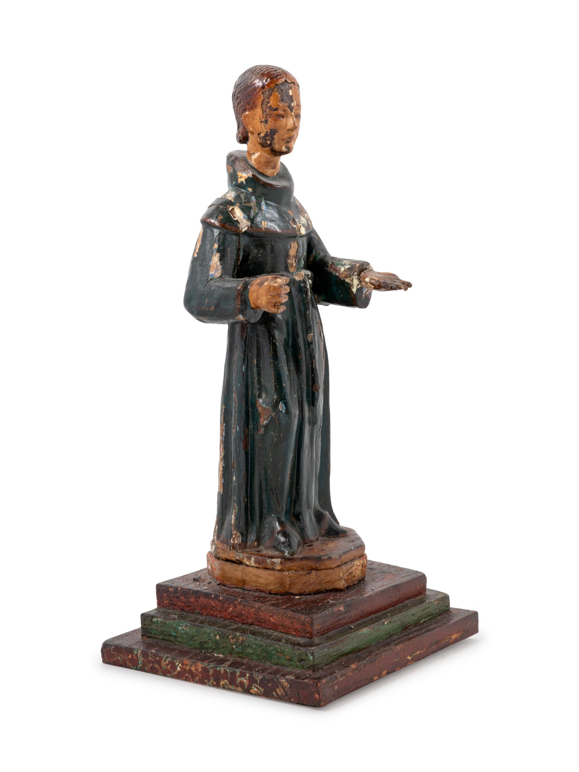 A Continental Painted Figure of a Saint