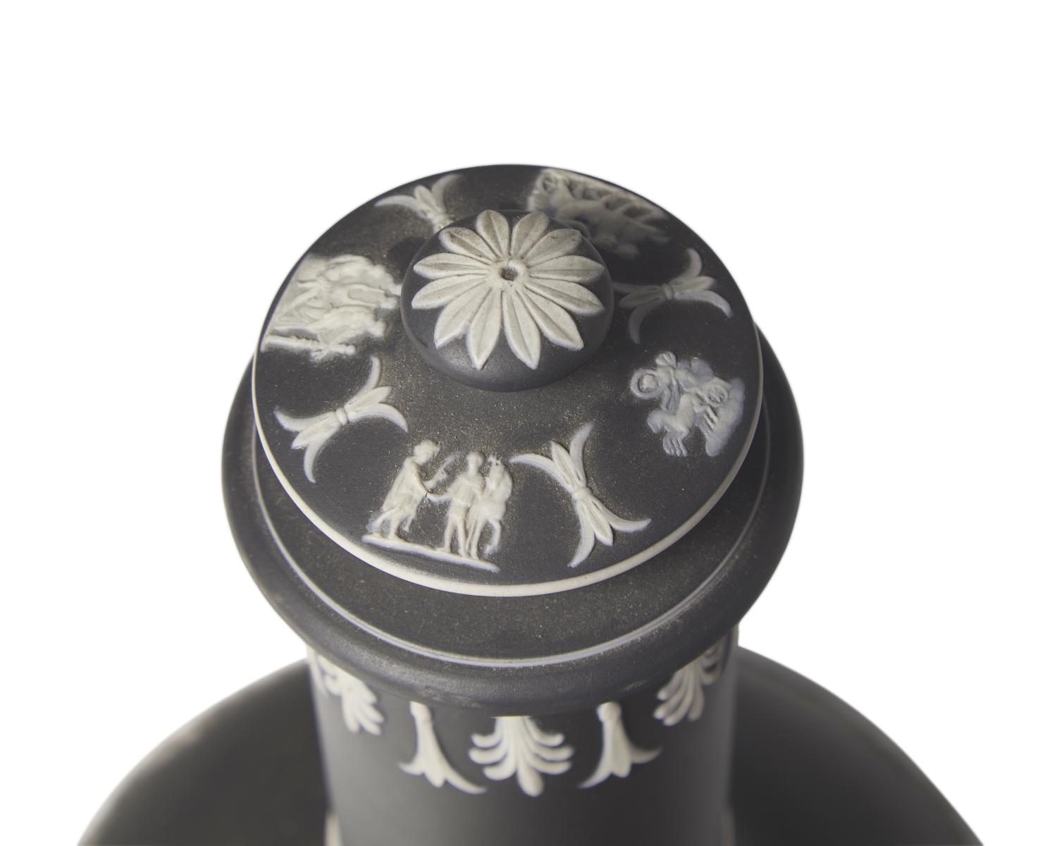 A Wedgwood Black Jasperware Bottle Vase and Cover