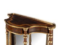 A Regency Rosewood, Parcel-Gilt and Brass Mounted Console Table