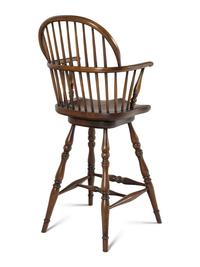 An Assembled Set of Nine Yew, Elm and Beechwood Windsor Armchairs