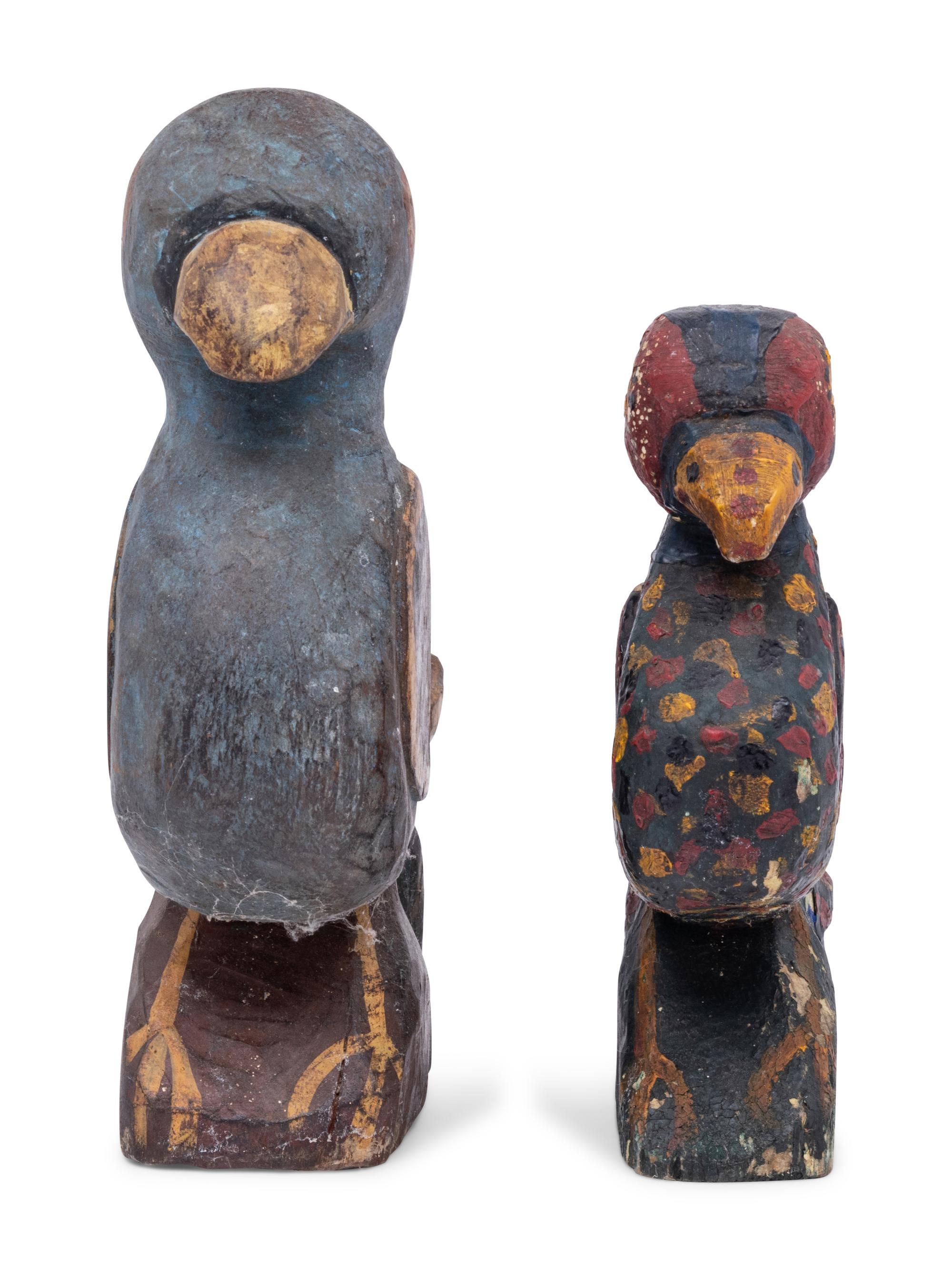 A Pair of Carved and Polychrome Painted Wooden Birds
