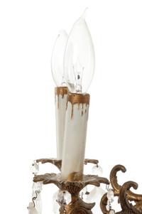 A Continental Gilt Metal and Cut Glass Sixteen-Light Chandelier