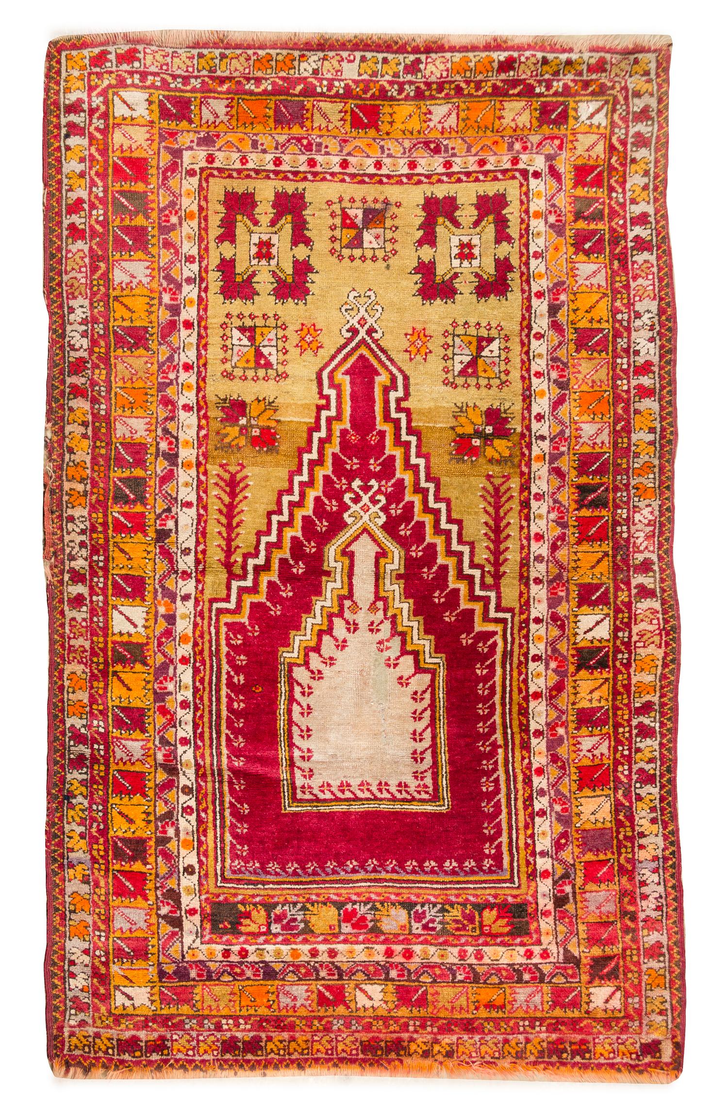 A Turkish Wool Rug 6 feet 2 inches x 3 feet 11 inches.