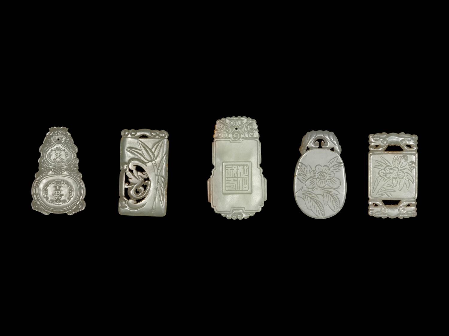 Five Chinese White and Pale Celadon Jade Plaques