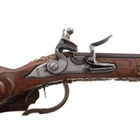 Contemporary Cheekstock Flintlock Rifle in the Style of Schertiger by John B. Derrick (American, b.1936)