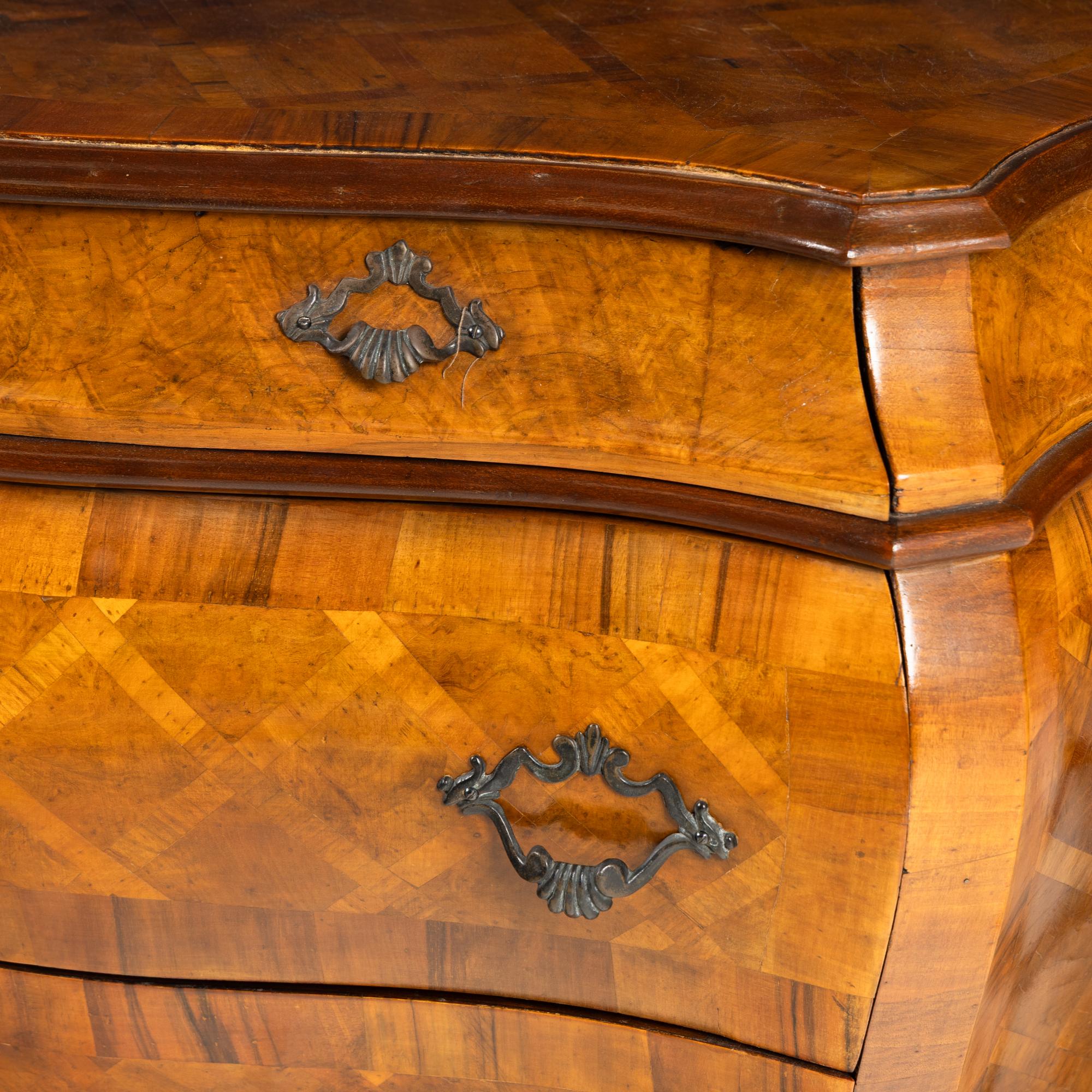 A Pair of Italian Parquetry Bombé Commodes