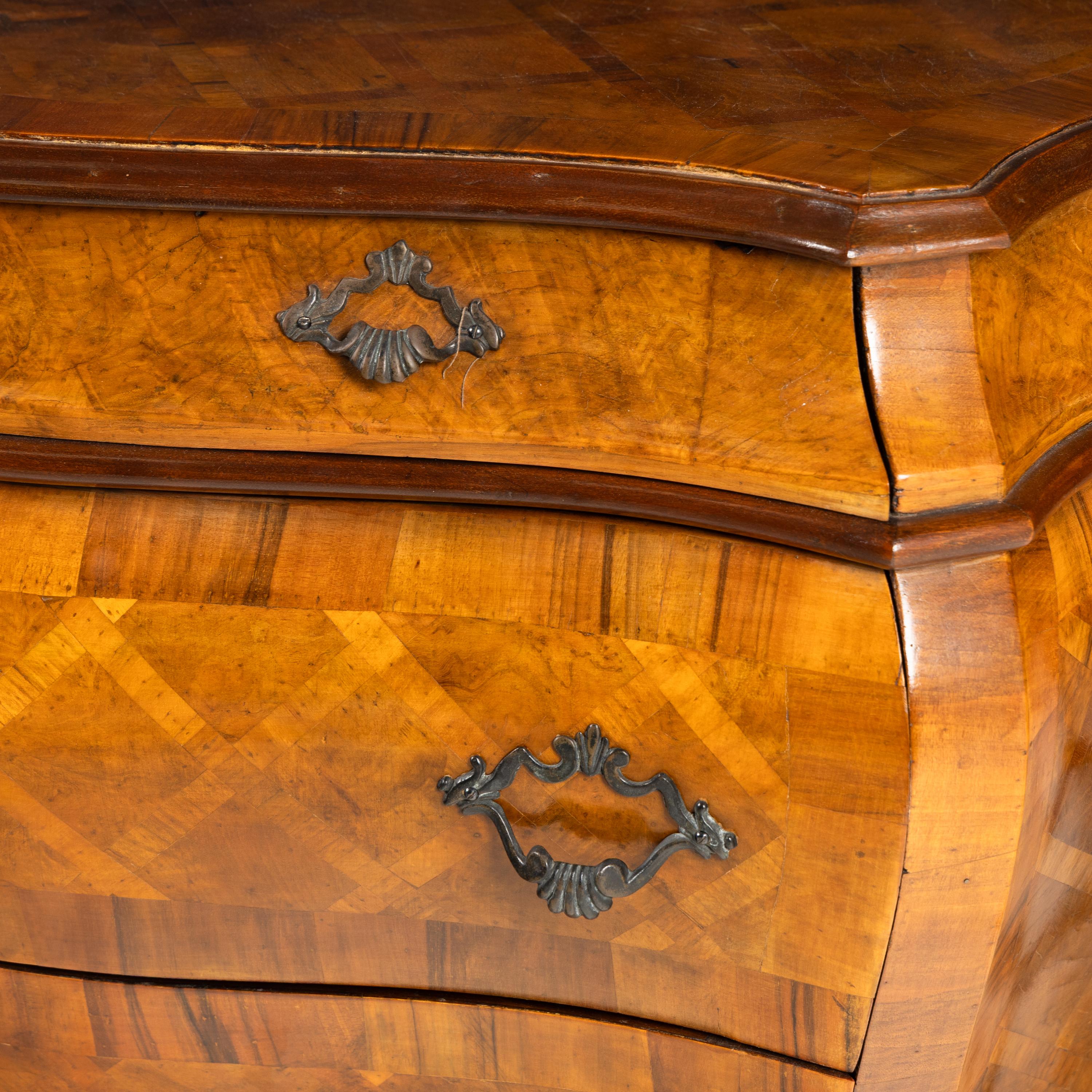 A Pair of Italian Parquetry Bombé Commodes
