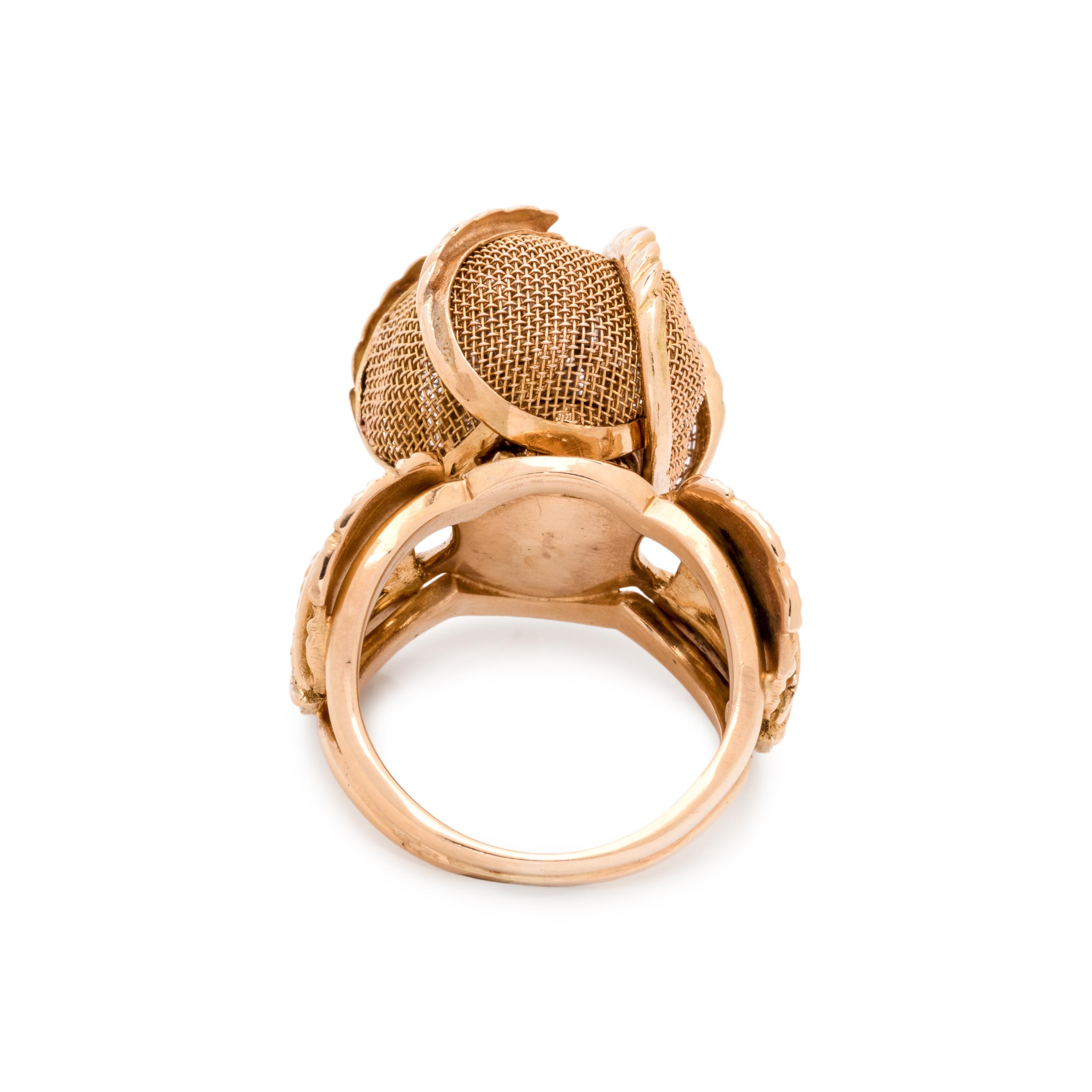 YELLOW GOLD AND DIAMOND ARTICULATED FLOWER RING