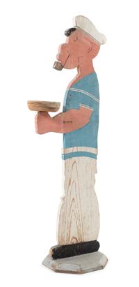 A Standing "Popeye" Tip Tray Height 39 inches. — Mid 20th Century