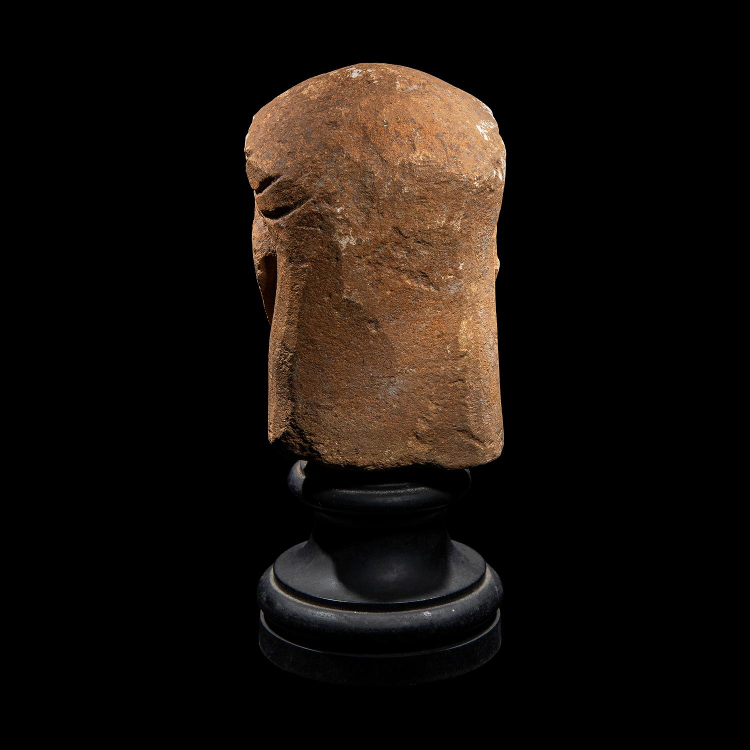 A Cypriot Limestone Votive Head
