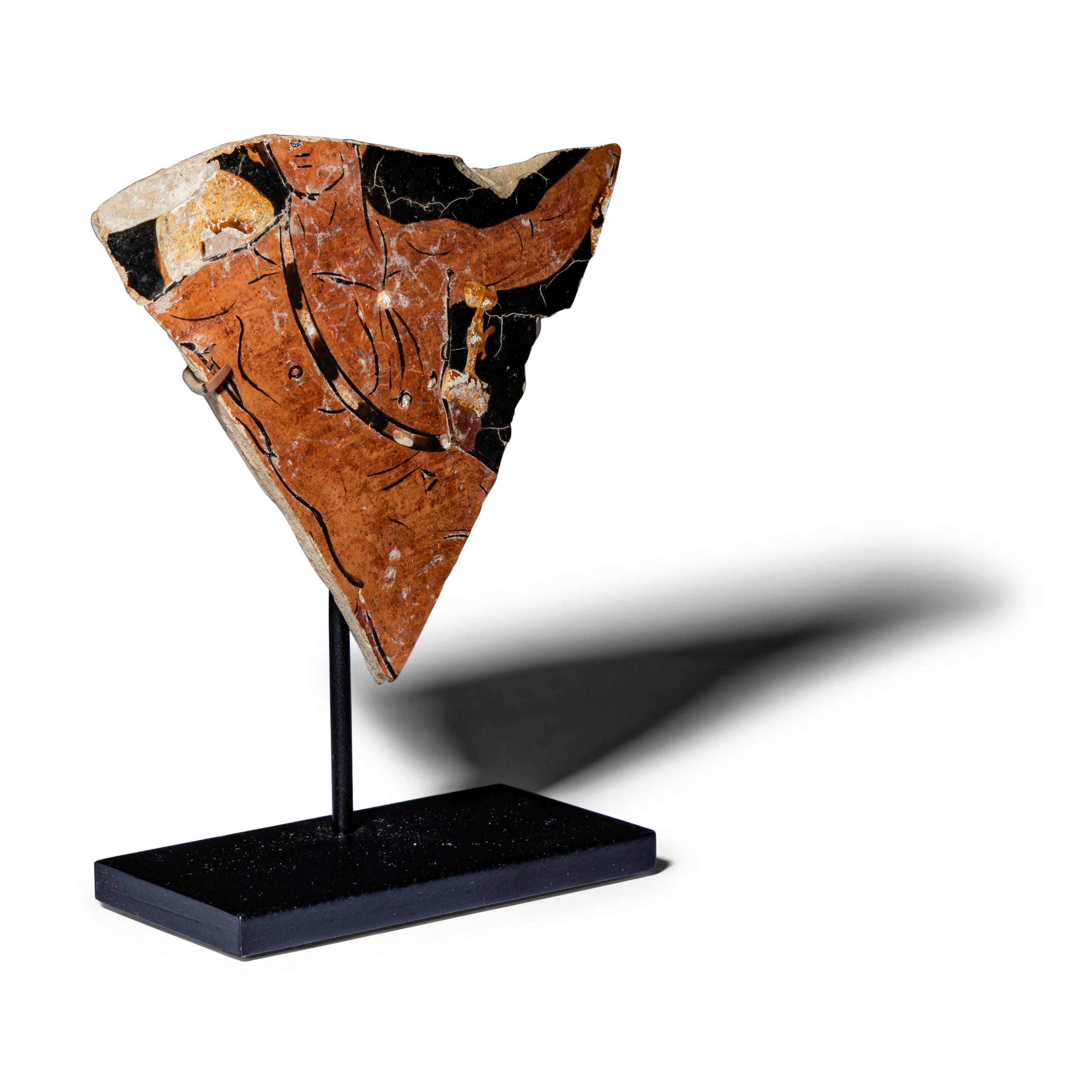 An Apulian Red-Figured Vase Fragment with a Warrior