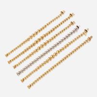 A collection of six fourteen karat gold bracelets