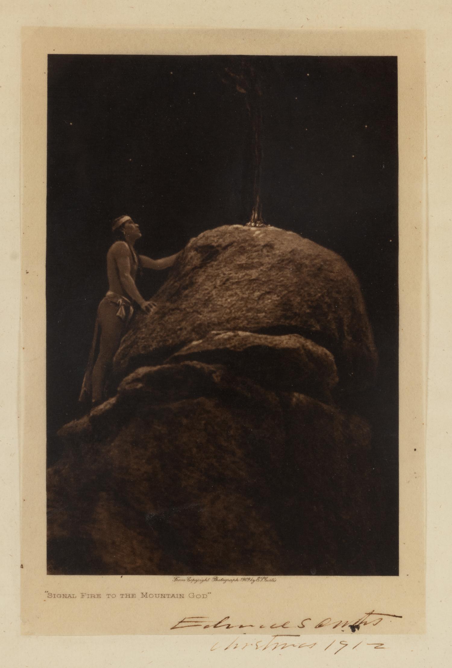 CURTIS, Edward S. (1868-1952), photographer. Signal Fire to the Mountain Gods . Signed and inscribed by Curtis.