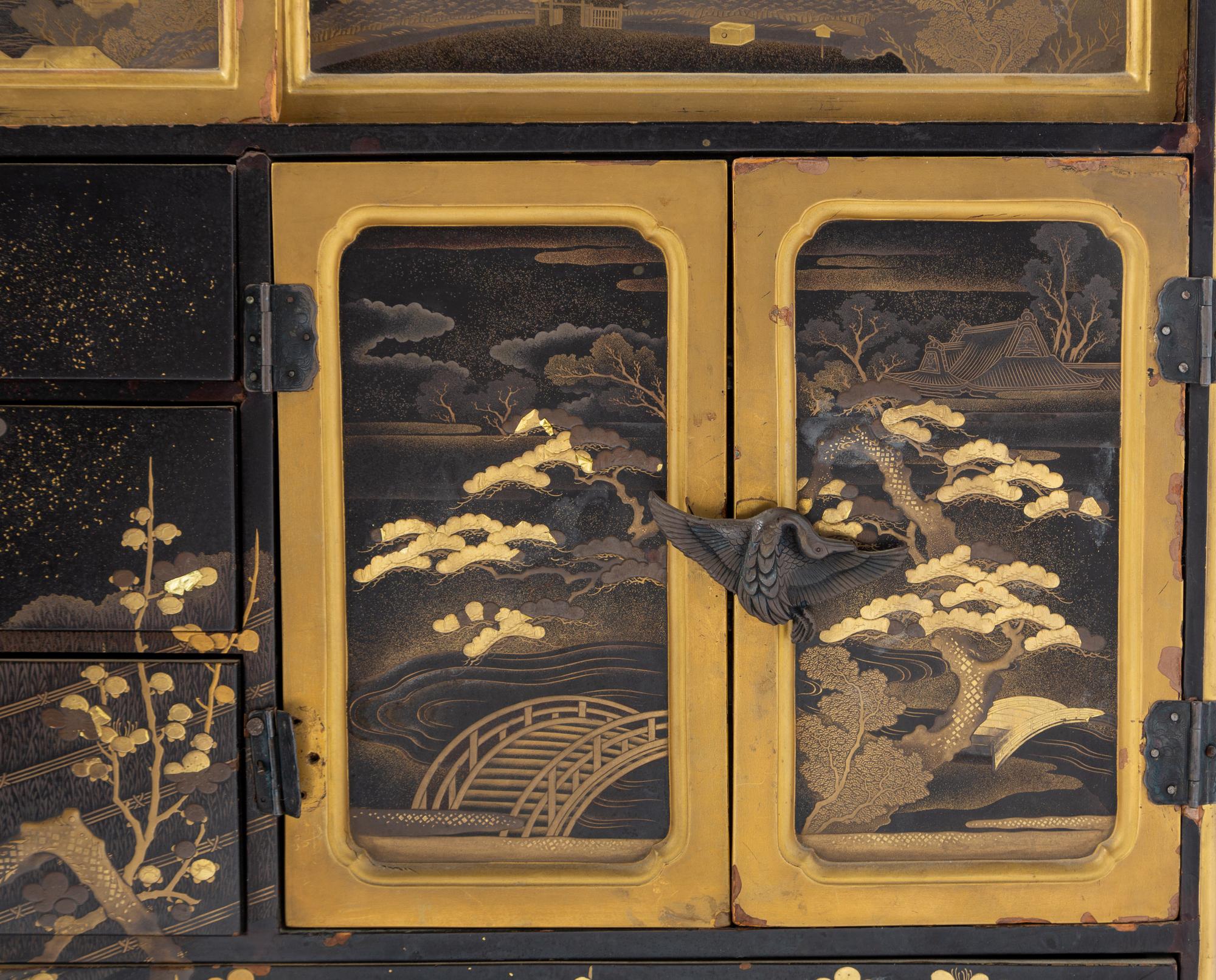 A Japanese Black and Gilt Decorated Table Cabinet, Kodanshu