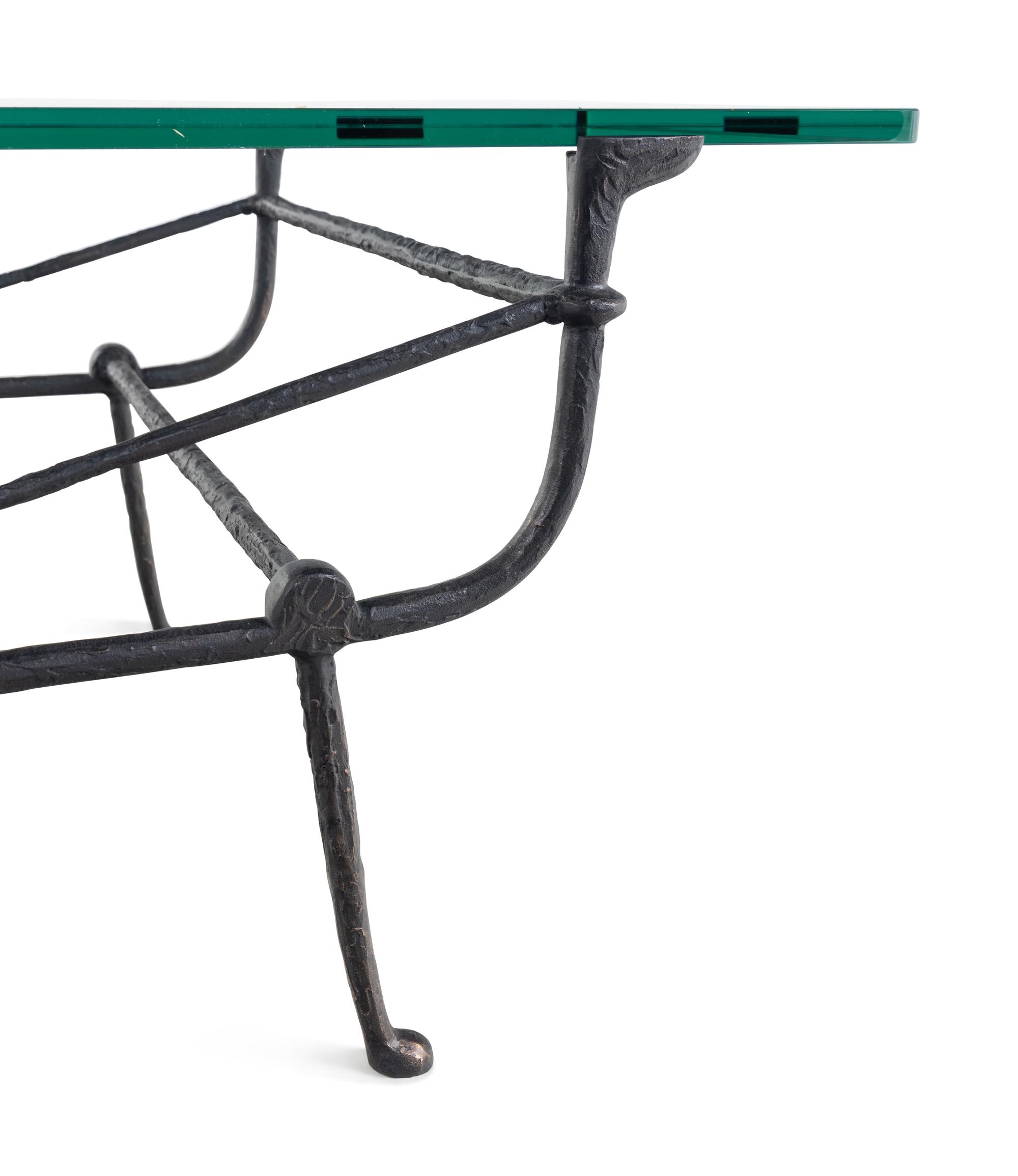 A Cast Iron and Glass Low Table in the Style of Giacometti
