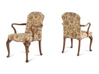 A Set of Four Queen Anne Style Walnut Armchairs