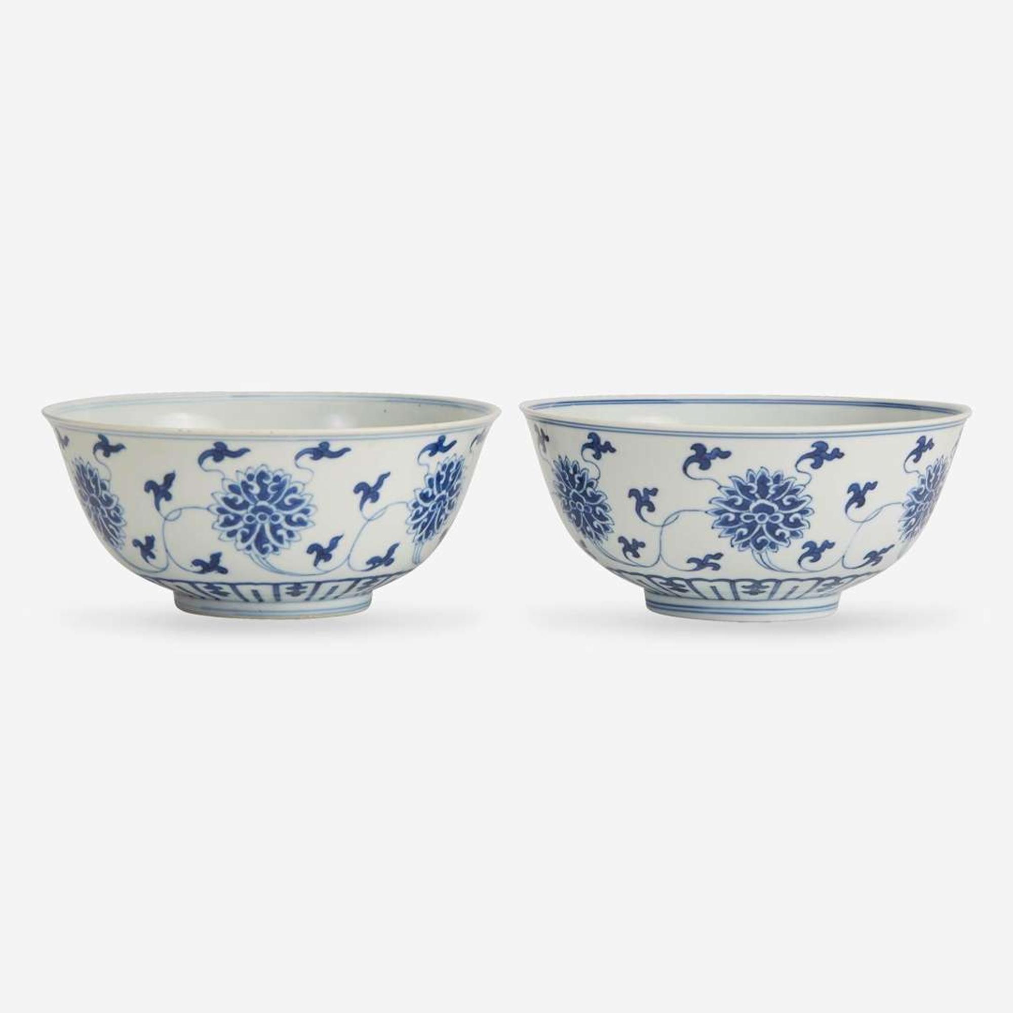 An associated pair of Chinese blue and white porcelain "Lotus" bowls 青花缠枝莲纹碗一对 Daoguang mark and probably of the period ??? ????
