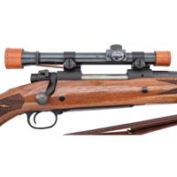 ** Winchester Model 70 with Lyman Alaskan Scope