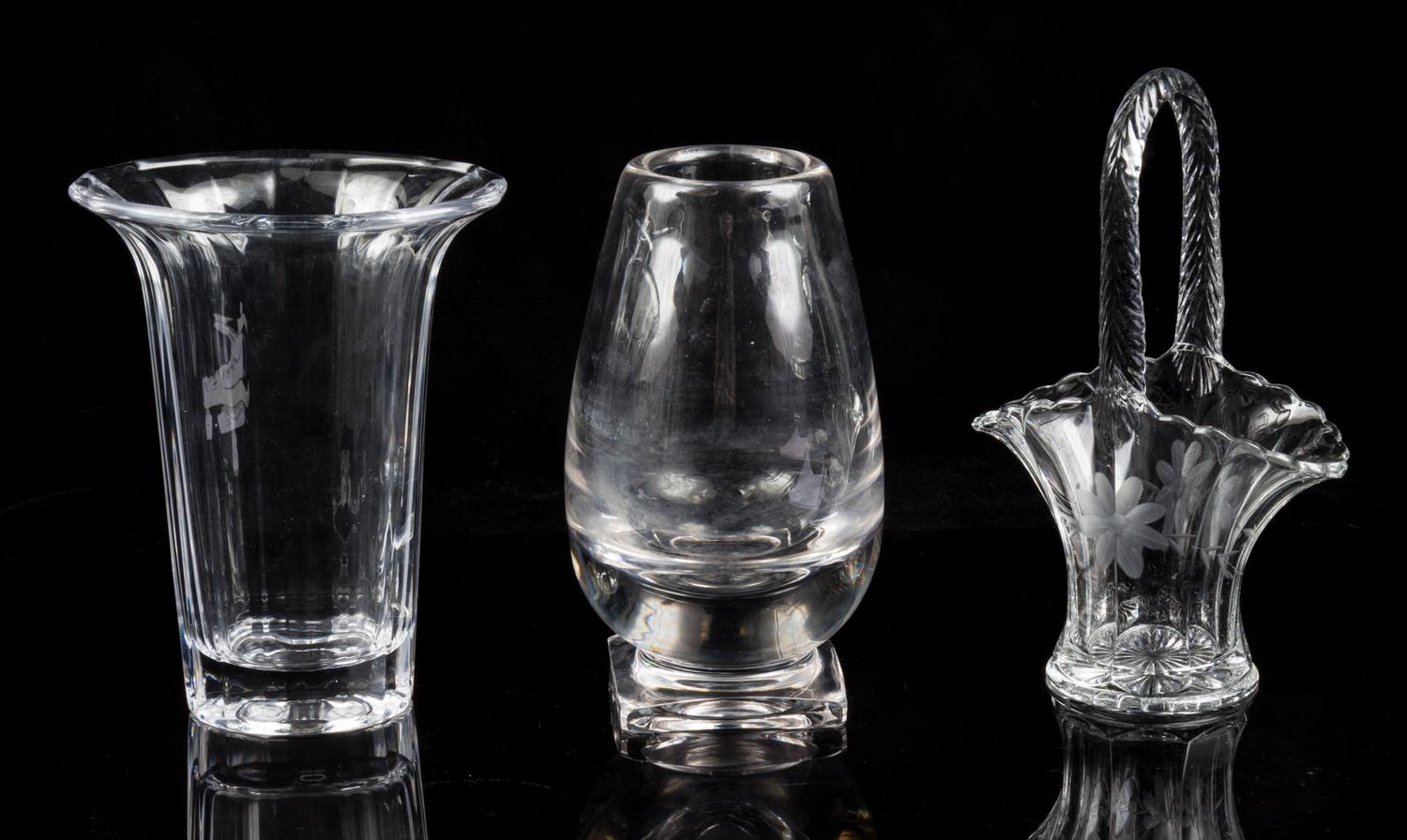 A Collection of Three Glass Vases Height of tallest 9 1/2 inches.