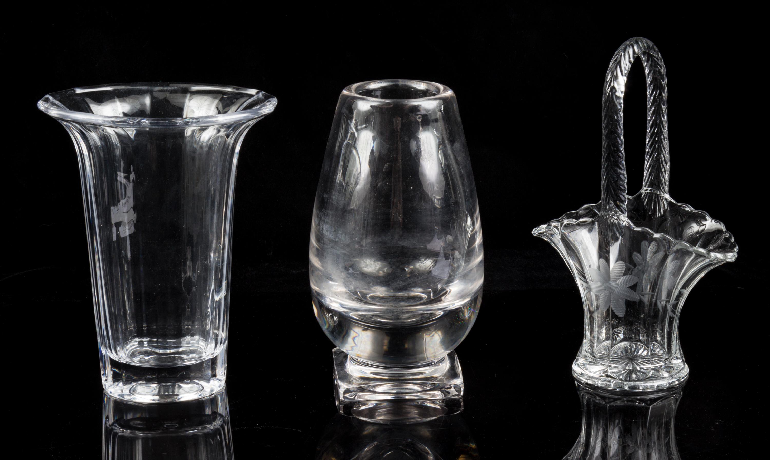 A Collection of Three Glass Vases Height of tallest 9 1/2 inches.