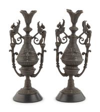 A Pair of Neoclassical Cast Metal Candlesticks