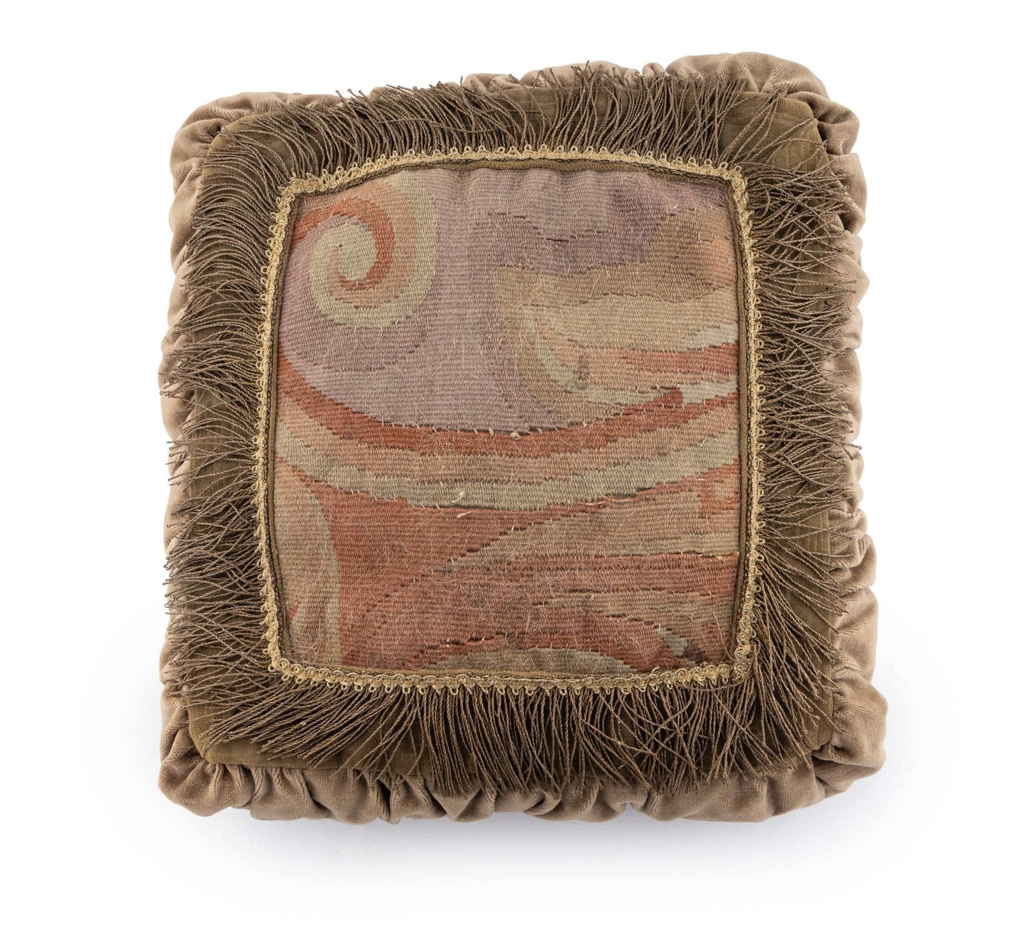 A Group of Three Tapestry Throw Pillows