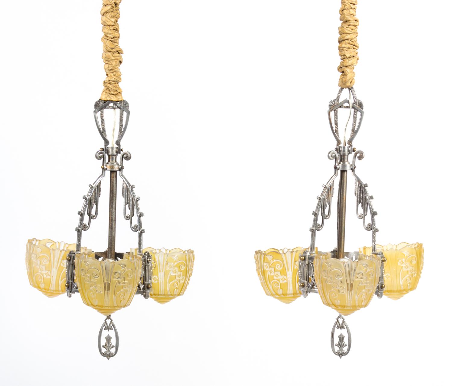 A Group of Seven Art Deco Style Silvered Metal Fixtures Height of chandelier 21 1/2 inches; height of sconce 14 1/4 inches. — LINCOLN MFG. CO., EARLY 20TH CENTURY