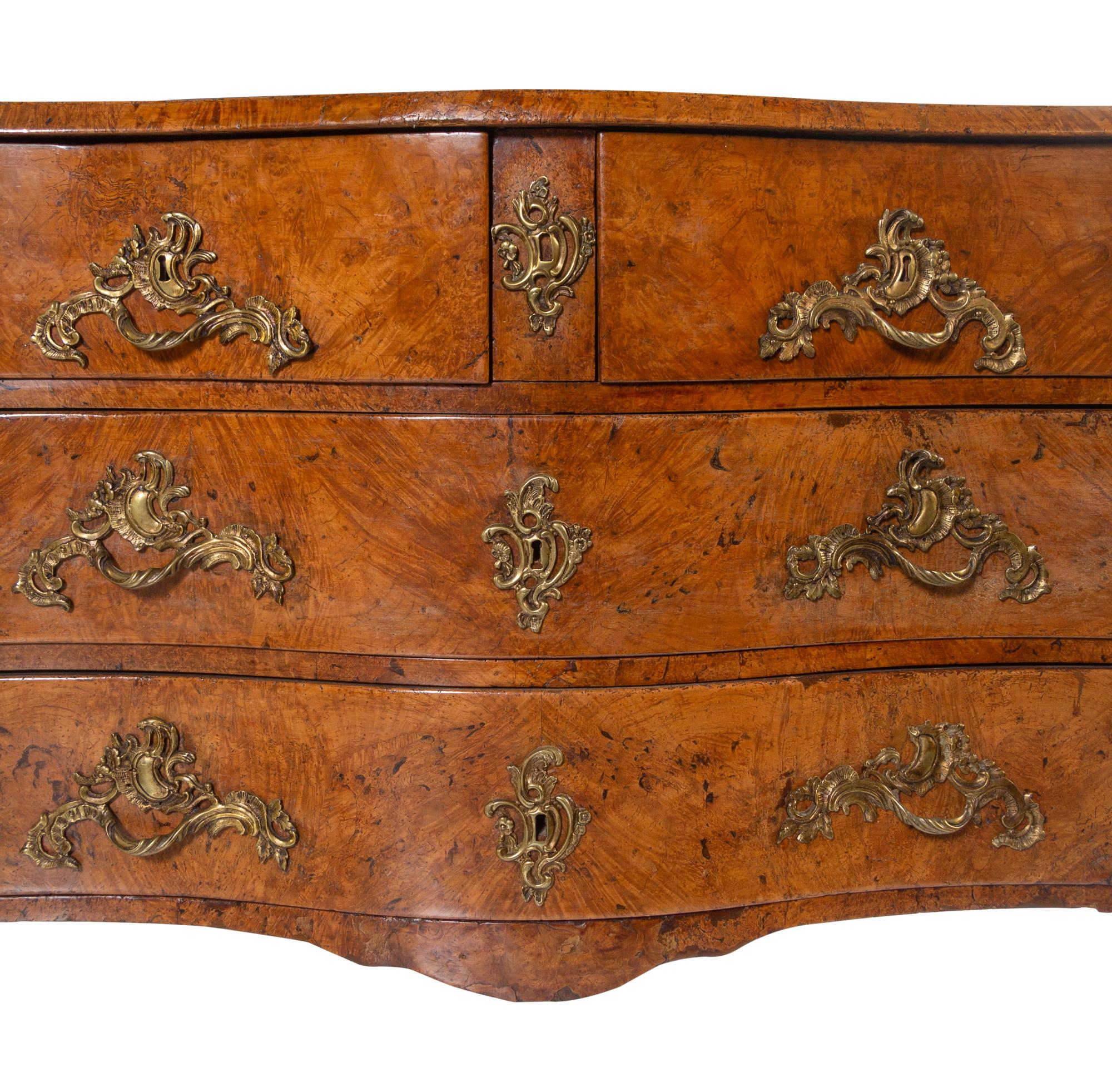 A Continental Burlwood Commode