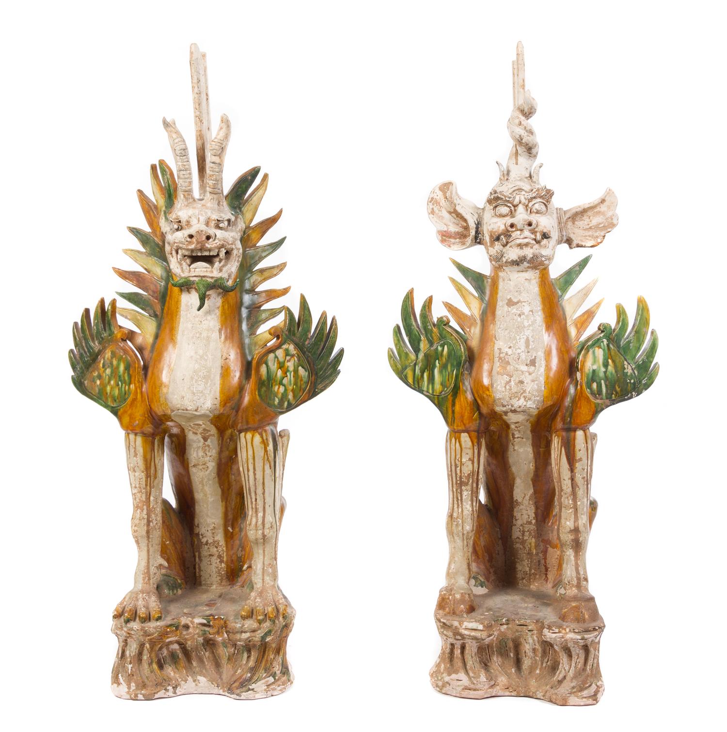 A Pair of Chinese Sancai Glazed Pottery Figures of Earth Spirit TANG DYNASTY Height 37 5/8 inches. — TANG DYNASTY