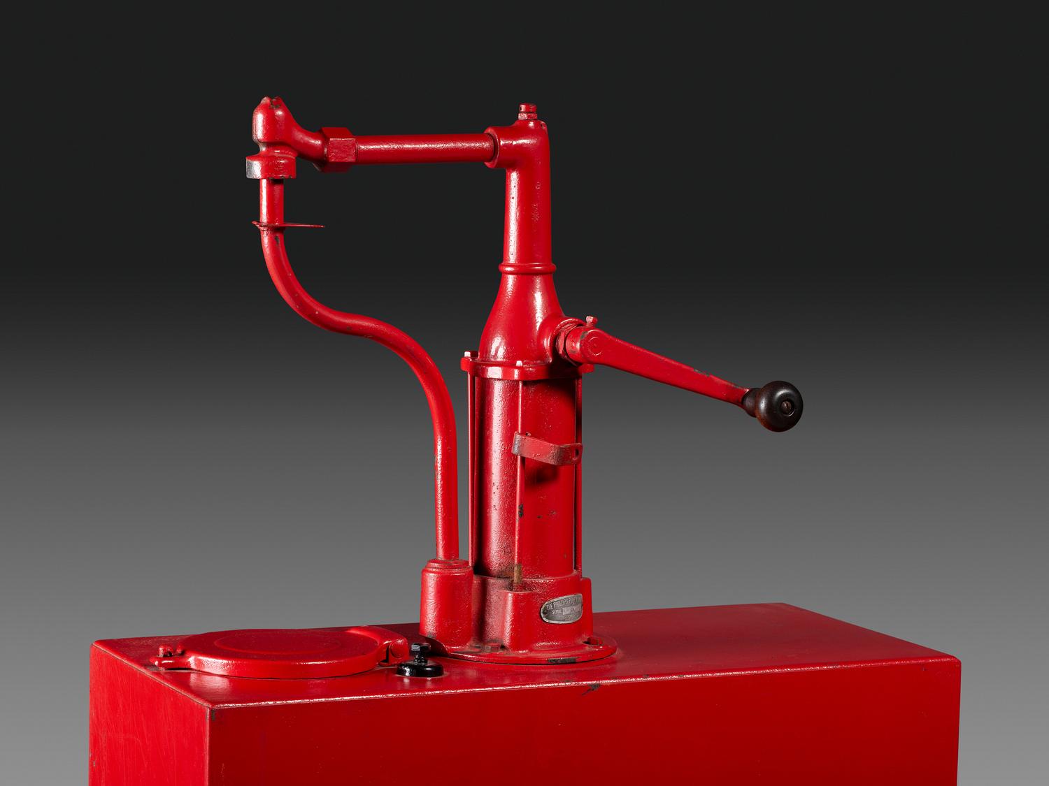 A Sohio Oil Dispenser with Hand Pump