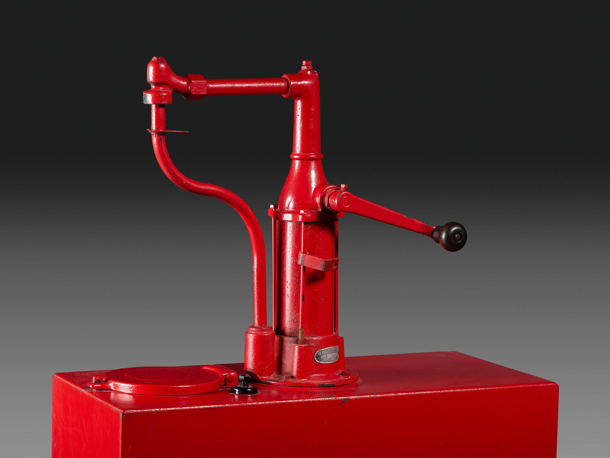A Sohio Oil Dispenser with Hand Pump