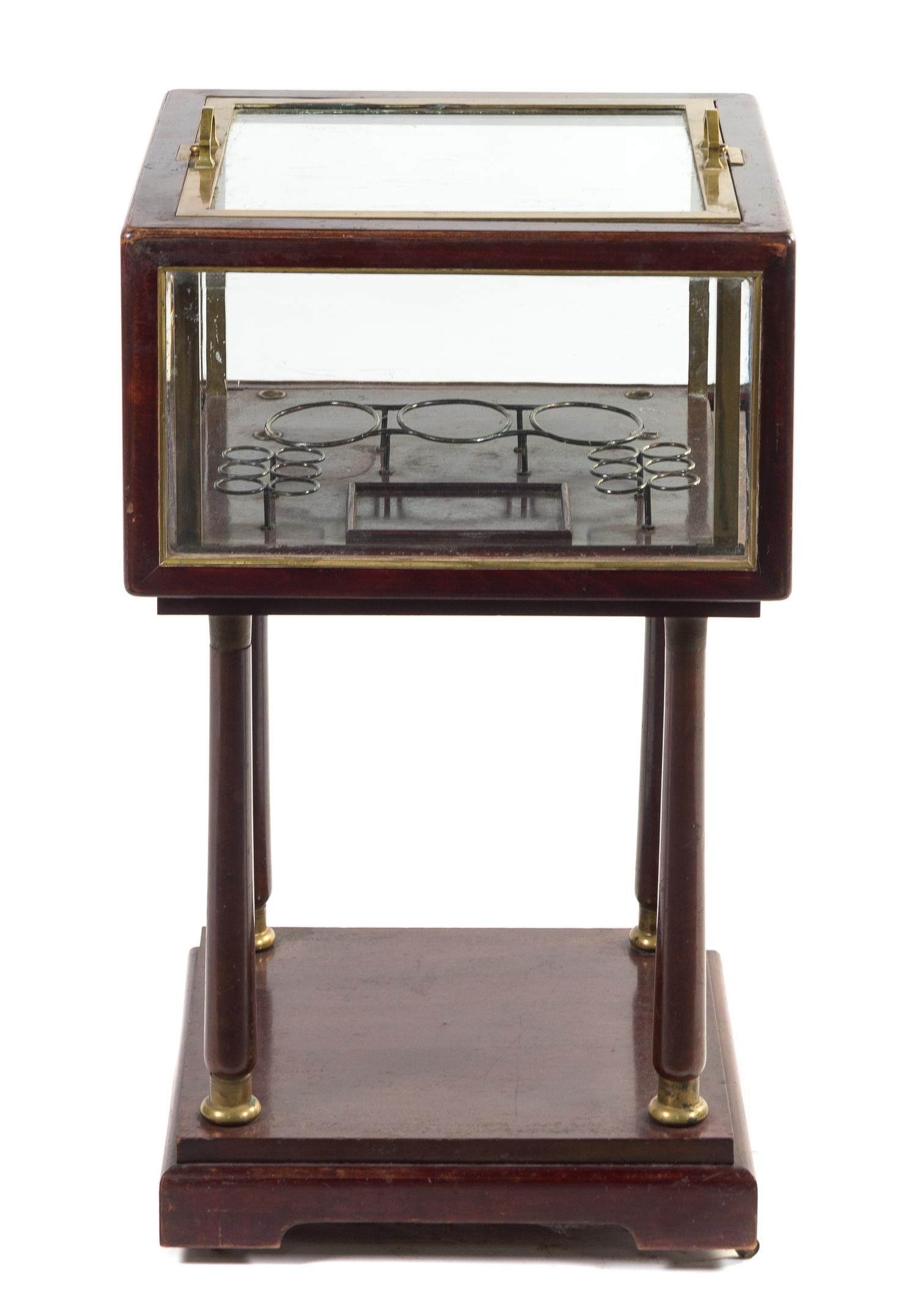 An Austrian Mahogany and Glass Bar Vitrine Height 31 1/2 inches.