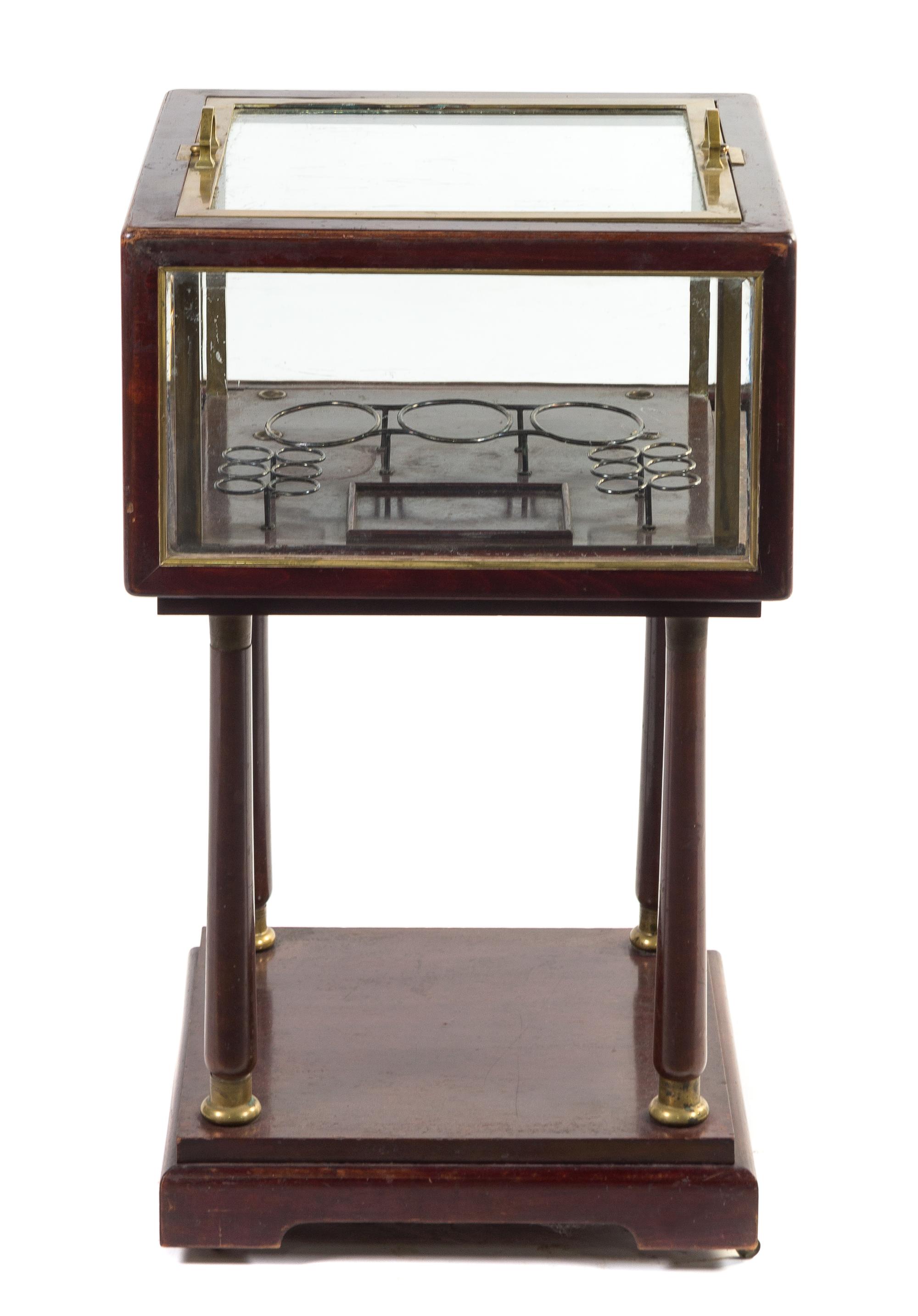 An Austrian Mahogany and Glass Bar Vitrine Height 31 1/2 inches.