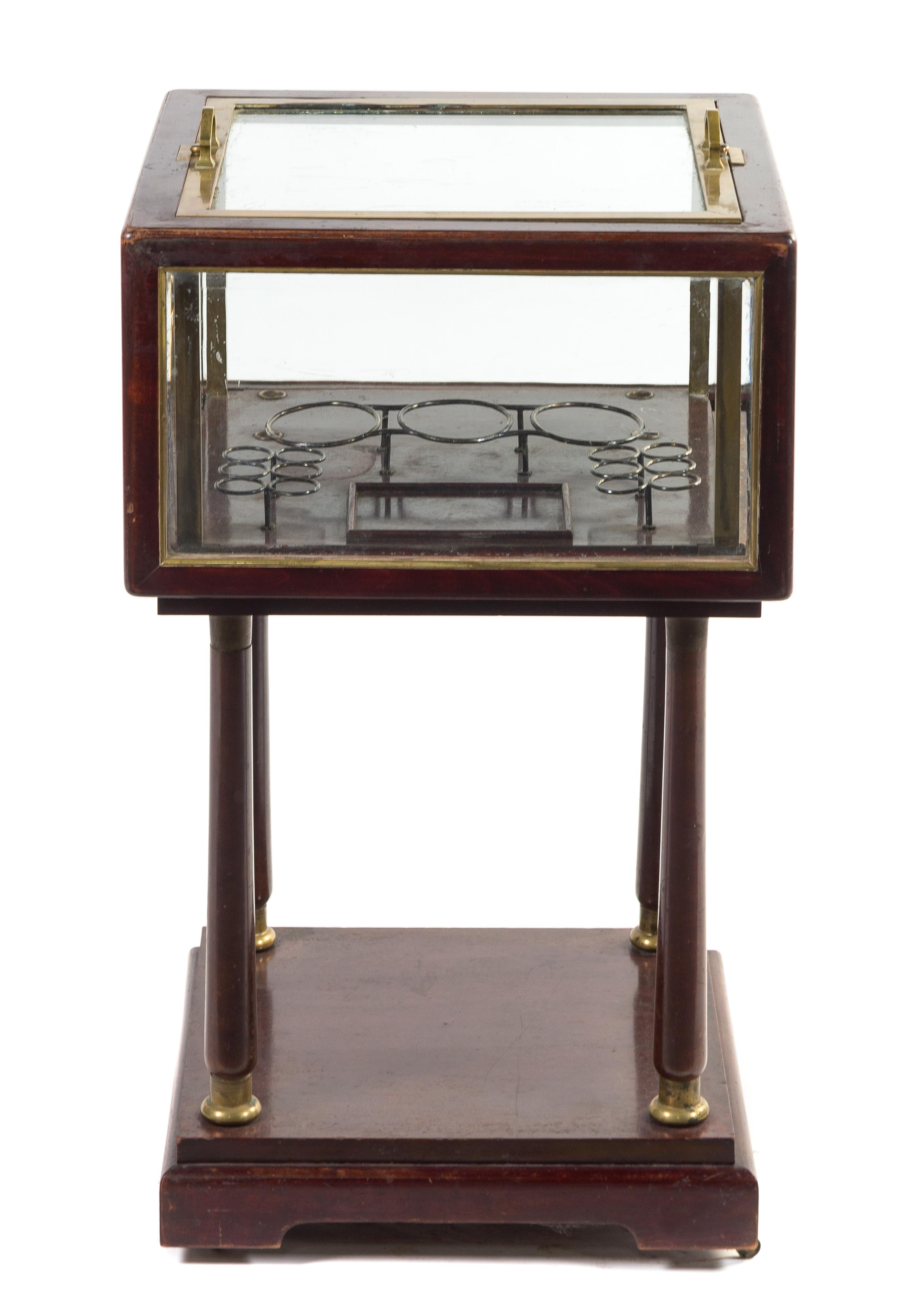 An Austrian Mahogany and Glass Bar Vitrine Height 31 1/2 inches.