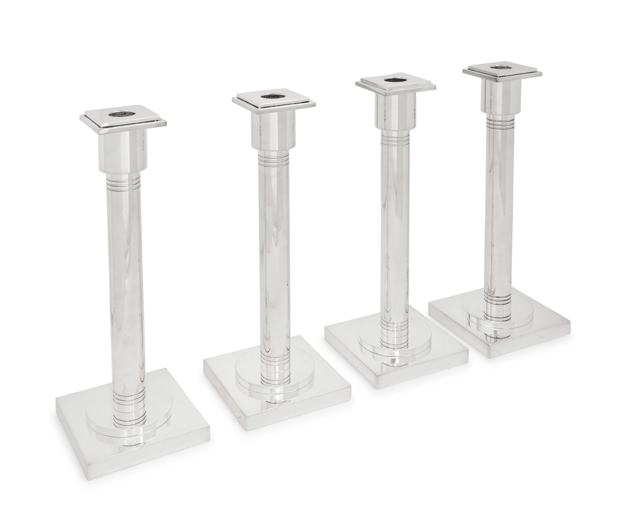 A Set of Four Art Deco Style Silver-Plate Candlesticks