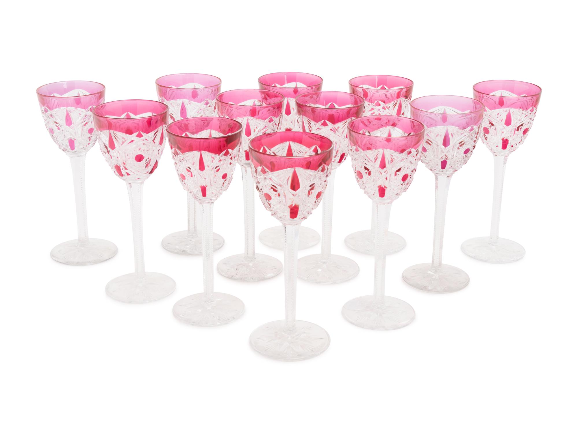A Set of Twelve Baccarat Cranberry Cut-to-Clear Hock Wine Glasses