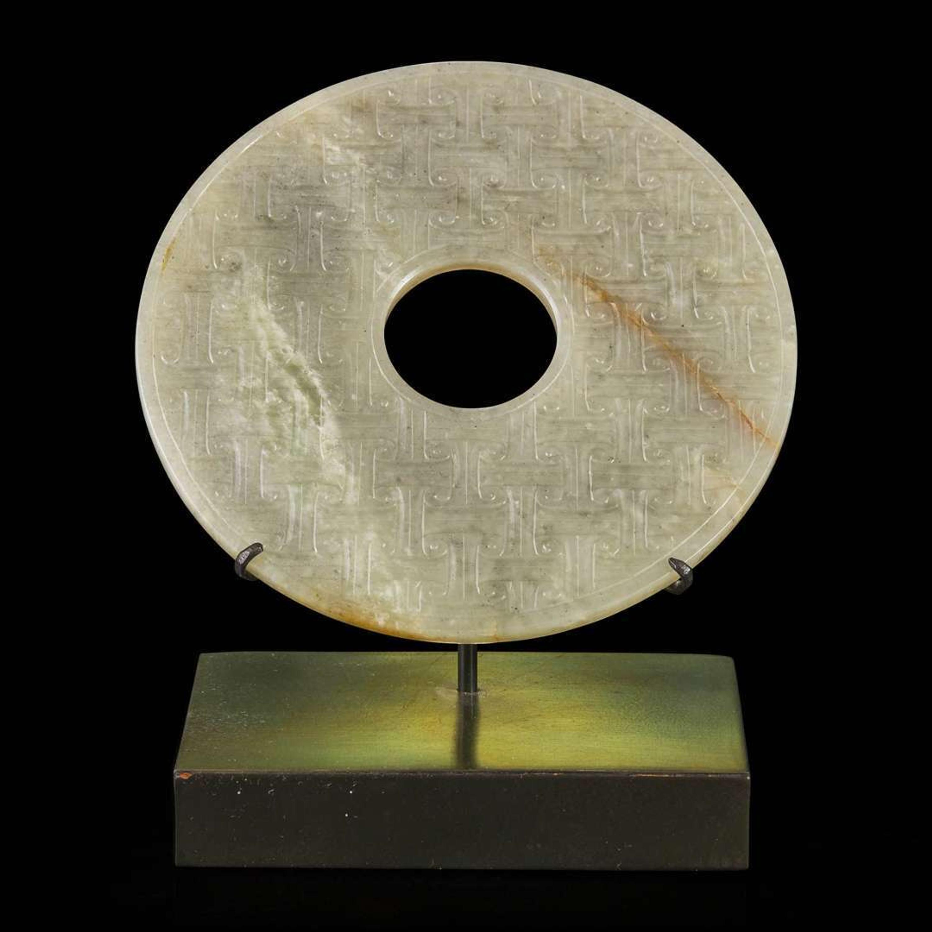 An unusual archaic style Chinese jade "Bi" disc 双头云纹与蒲纹仿古玉璧一件 18th /19th century or earlier ??????????