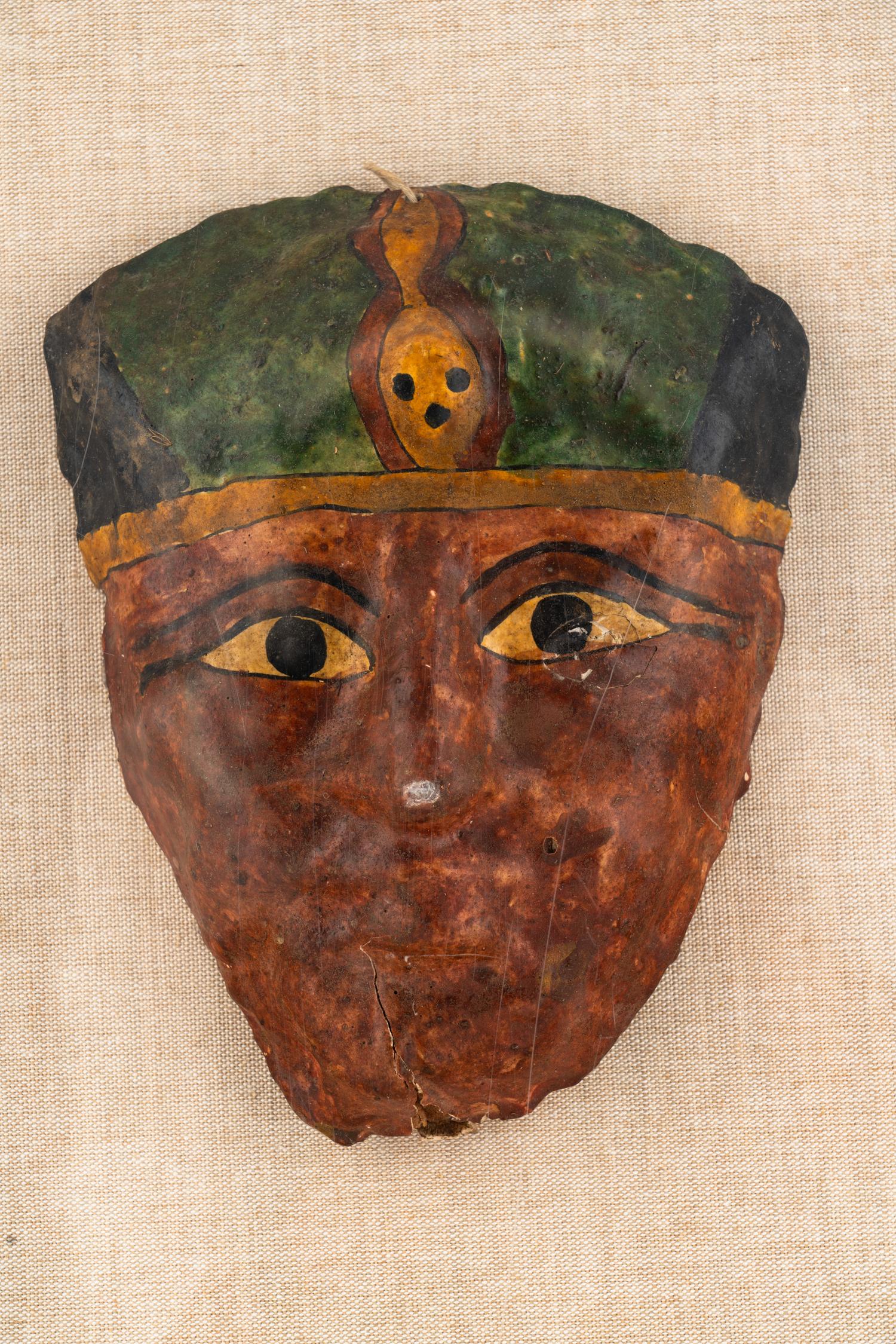 An Egyptian Cartonnage Mummy Mask