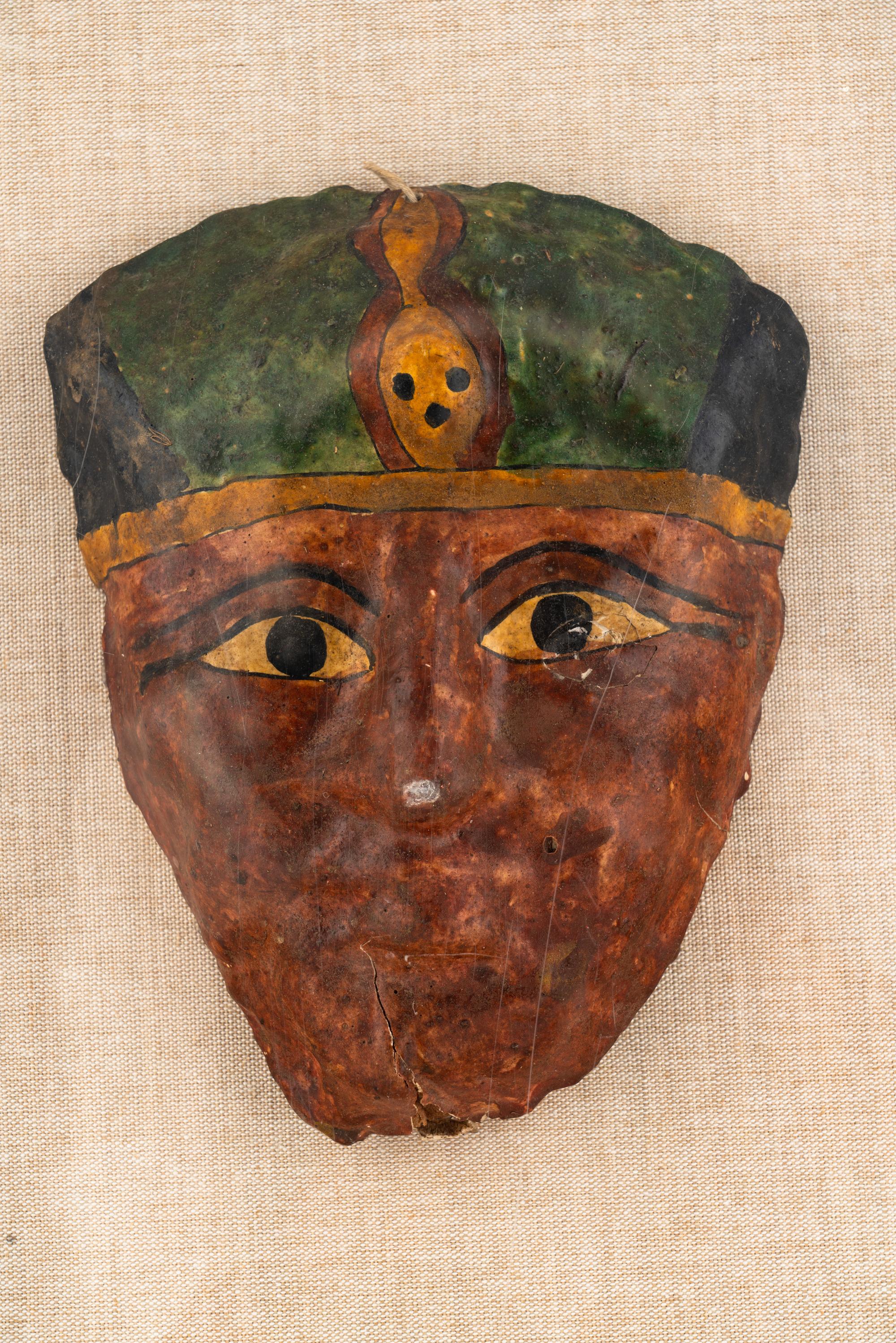 An Egyptian Cartonnage Mummy Mask