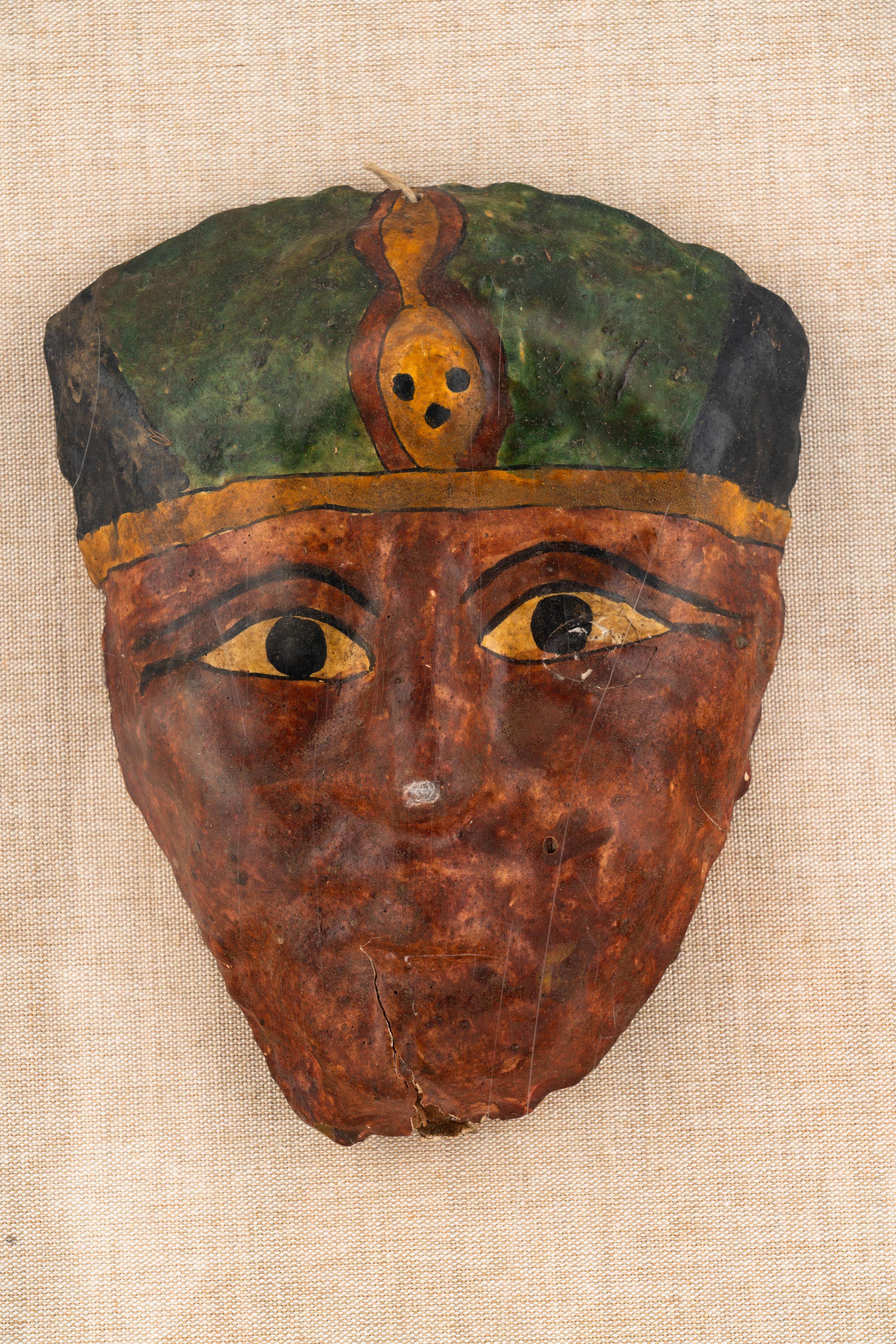 An Egyptian Cartonnage Mummy Mask