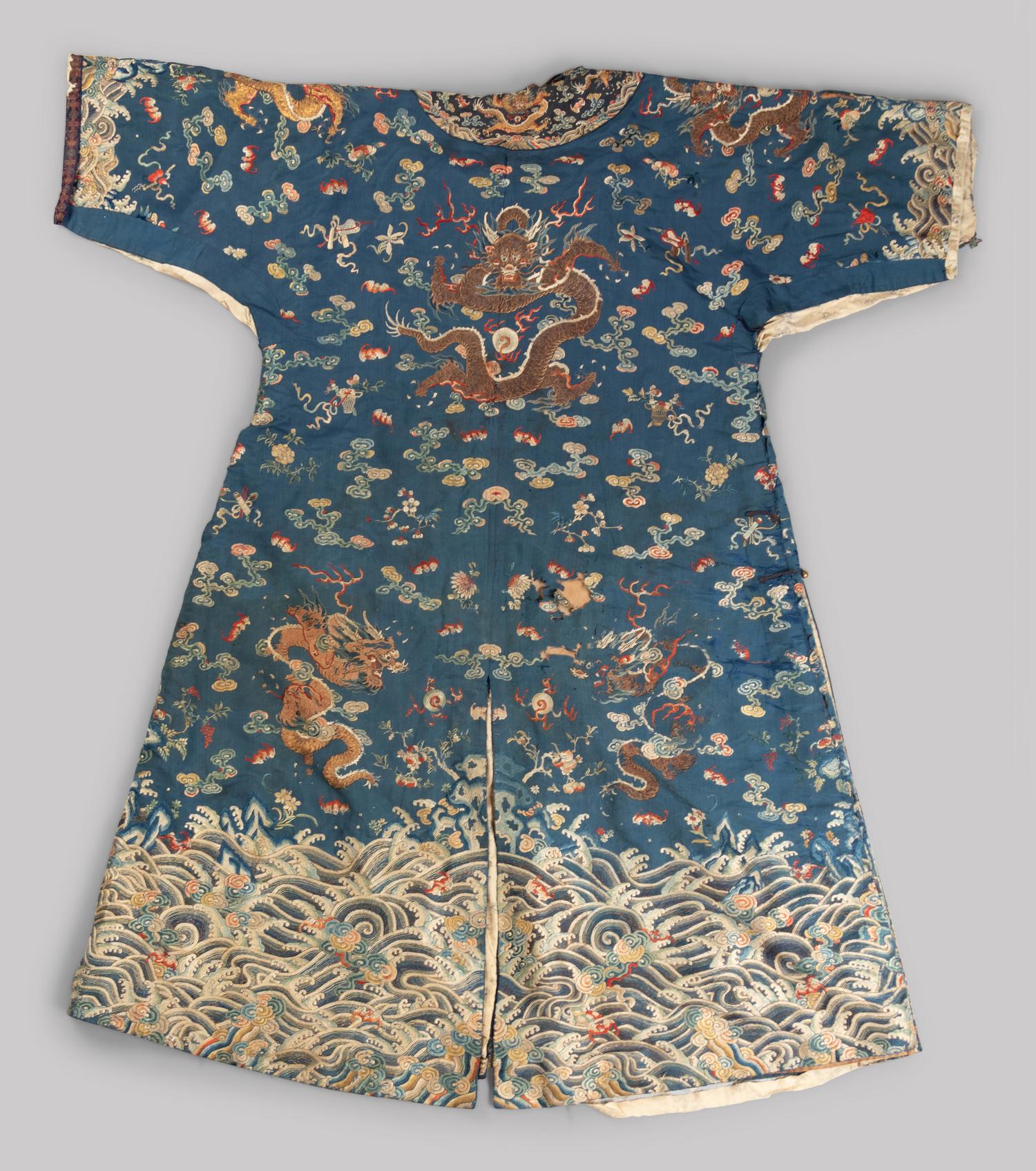 A Chinese Blue Ground Embroidered Silk Dragon Robe, Jifu